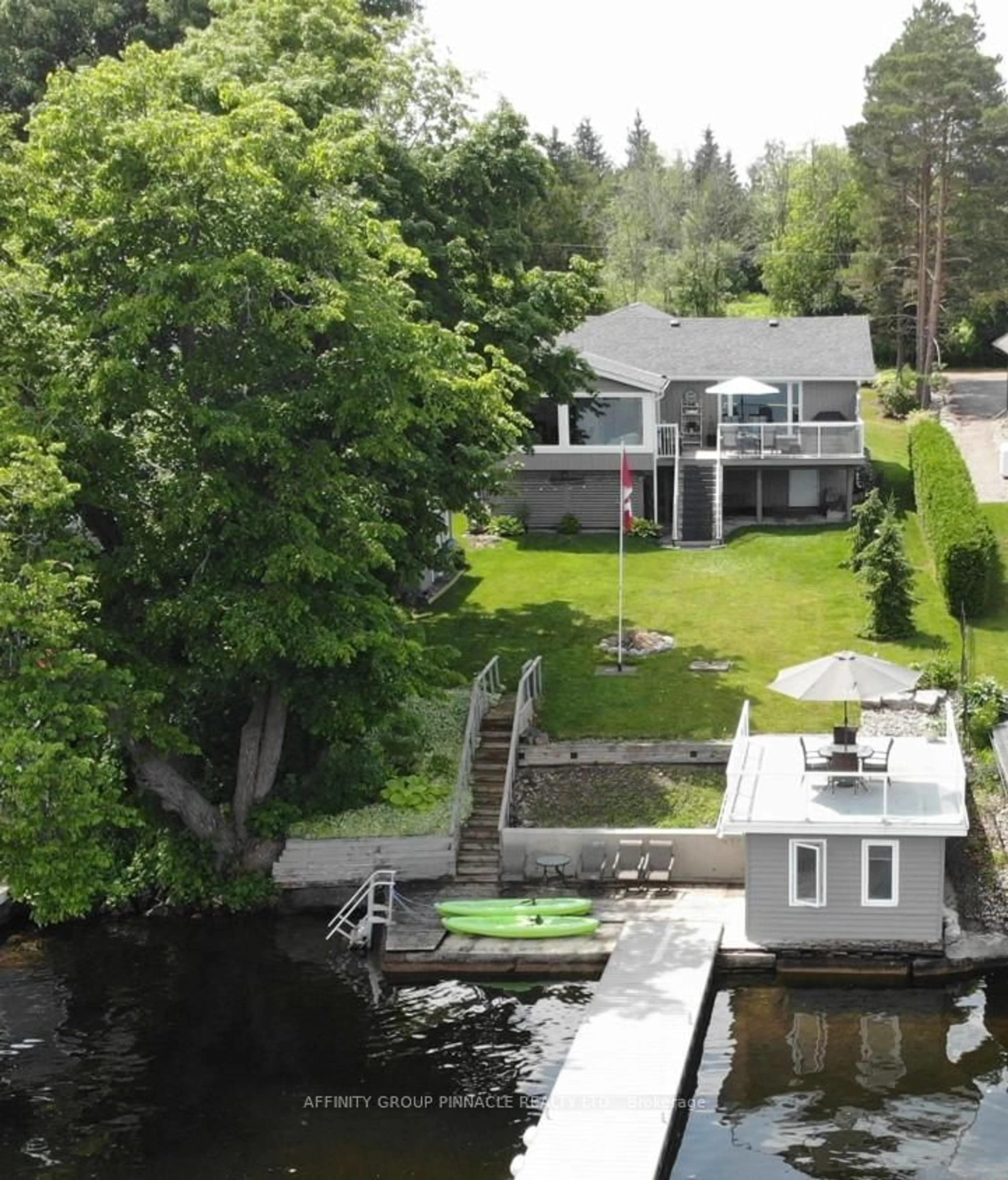 A pic from outside/outdoor area/front of a property/back of a property/a pic from drone, water/lake/river/ocean view for 64 Glenvale Dr, Kawartha Lakes Ontario K0M 1G0