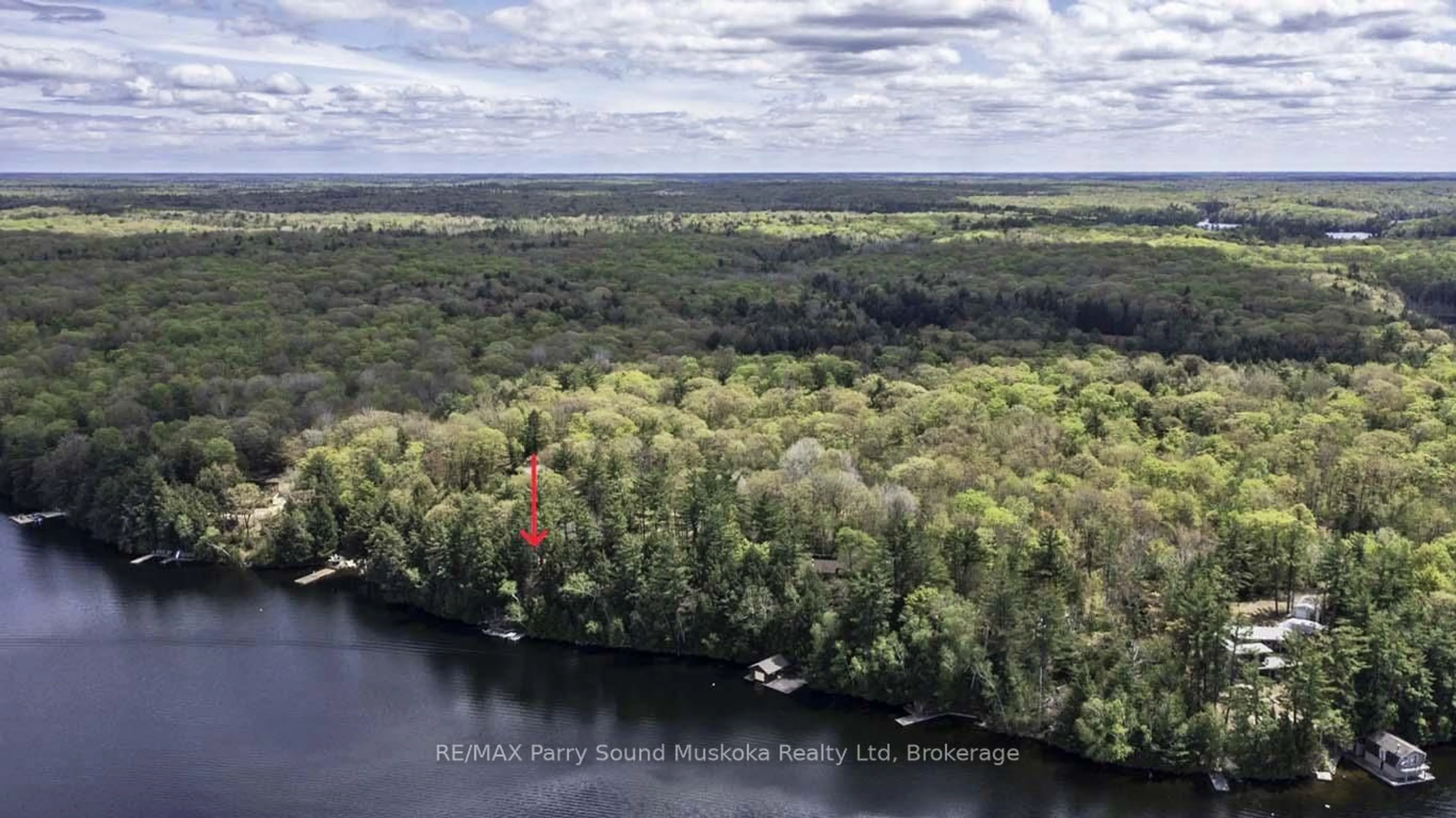 A pic from outside/outdoor area/front of a property/back of a property/a pic from drone, water/lake/river/ocean view for 33 Houston Lane, Seguin Ontario P2A 0B2
