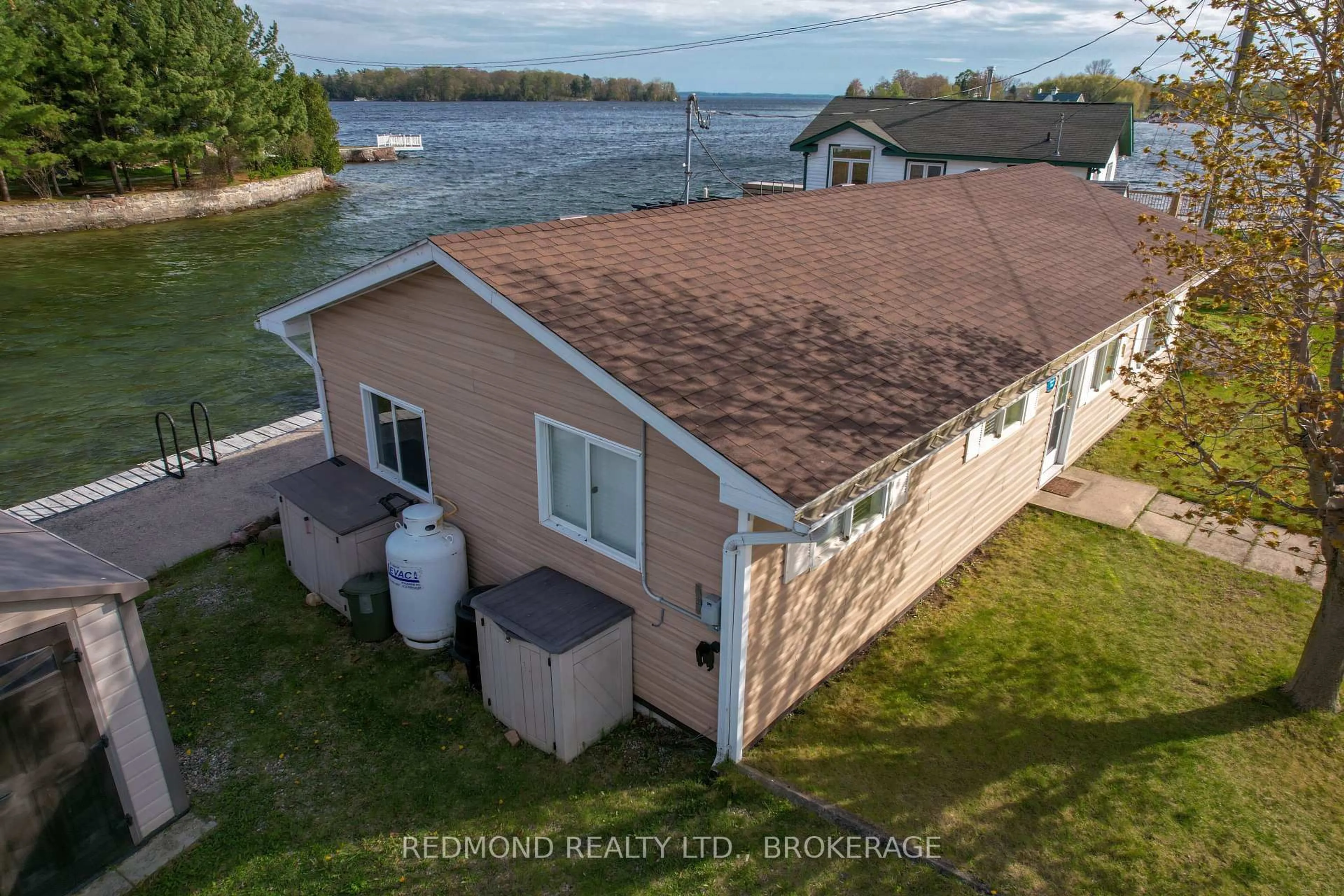 A pic from outside/outdoor area/front of a property/back of a property/a pic from drone, water/lake/river/ocean view for 396 Howe Island Ferry Rd, Gananoque Ontario K7G 2V5