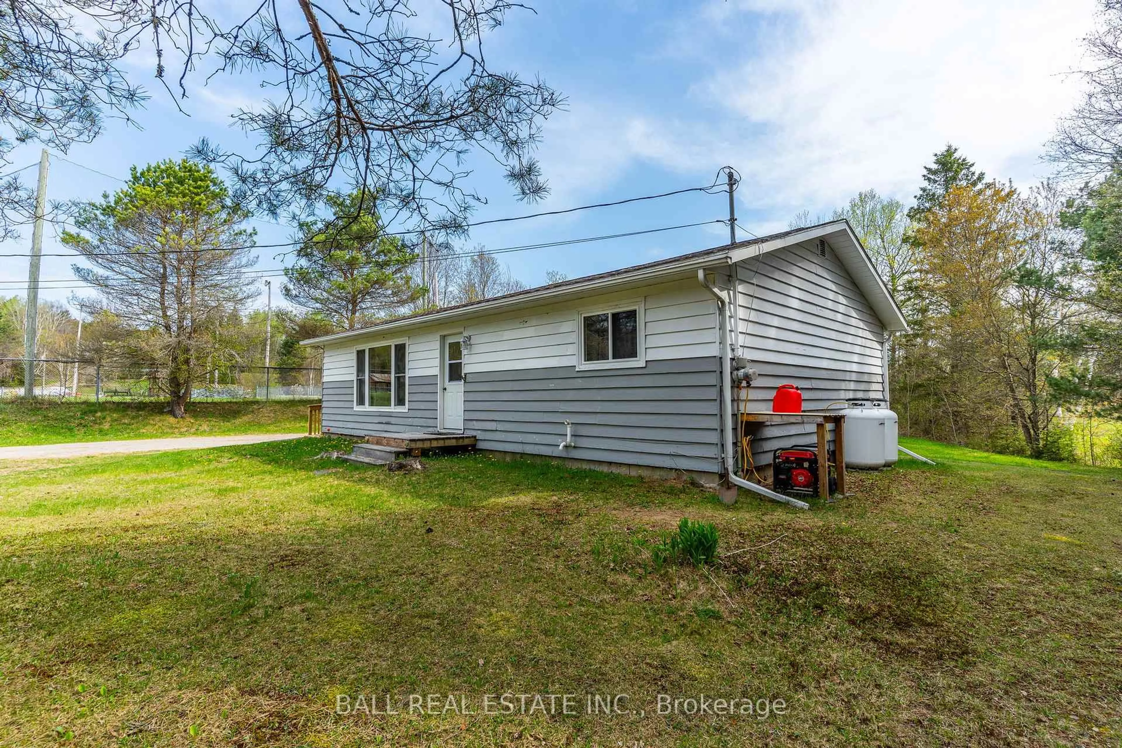 A pic from outside/outdoor area/front of a property/back of a property/a pic from drone, water/lake/river/ocean view for 1039 Rainbow Dr, Dysart et al Ontario K0L 1X0