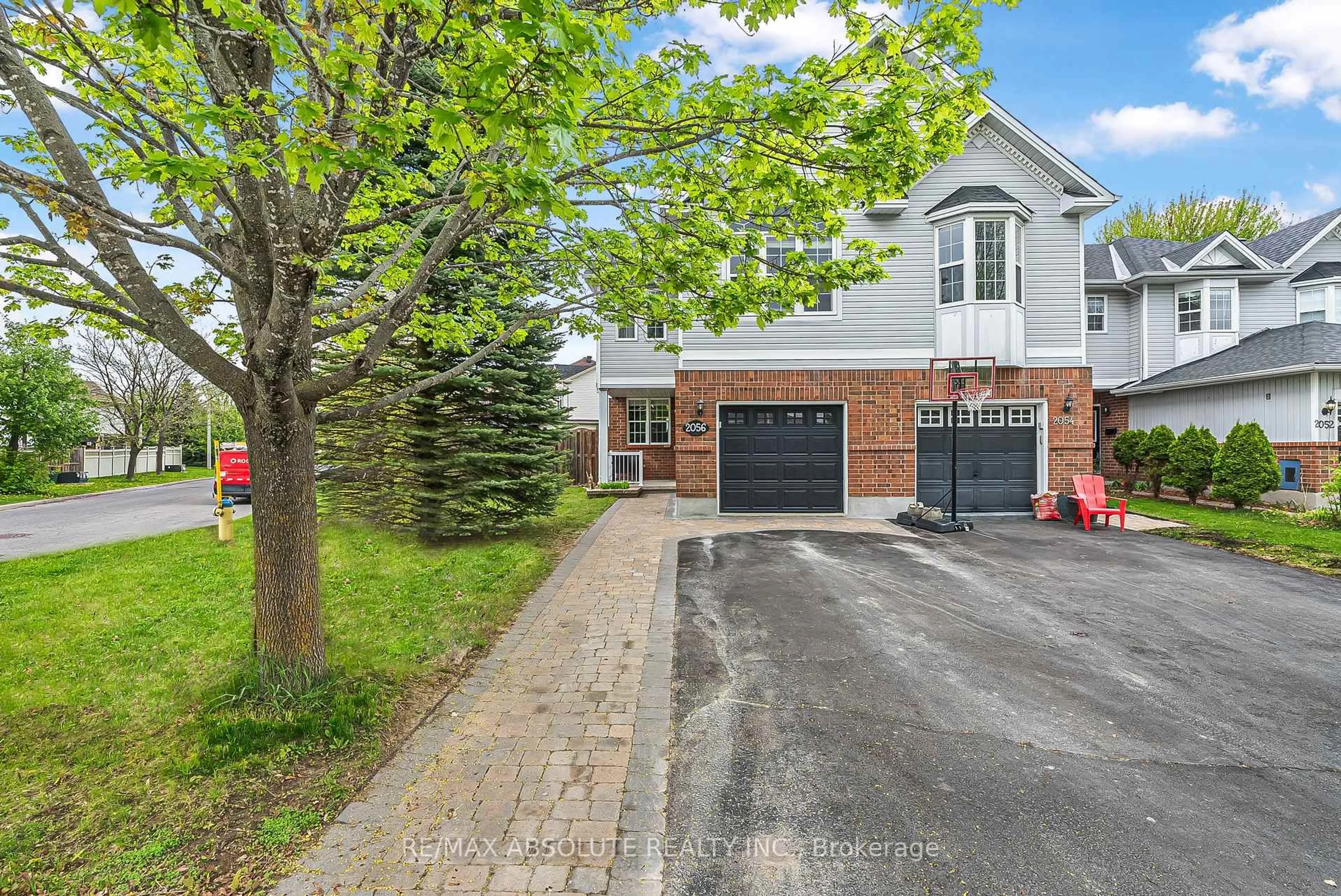 Home with brick exterior material, street for 2056 Breezewood St, Ottawa Ontario K4A 4S4