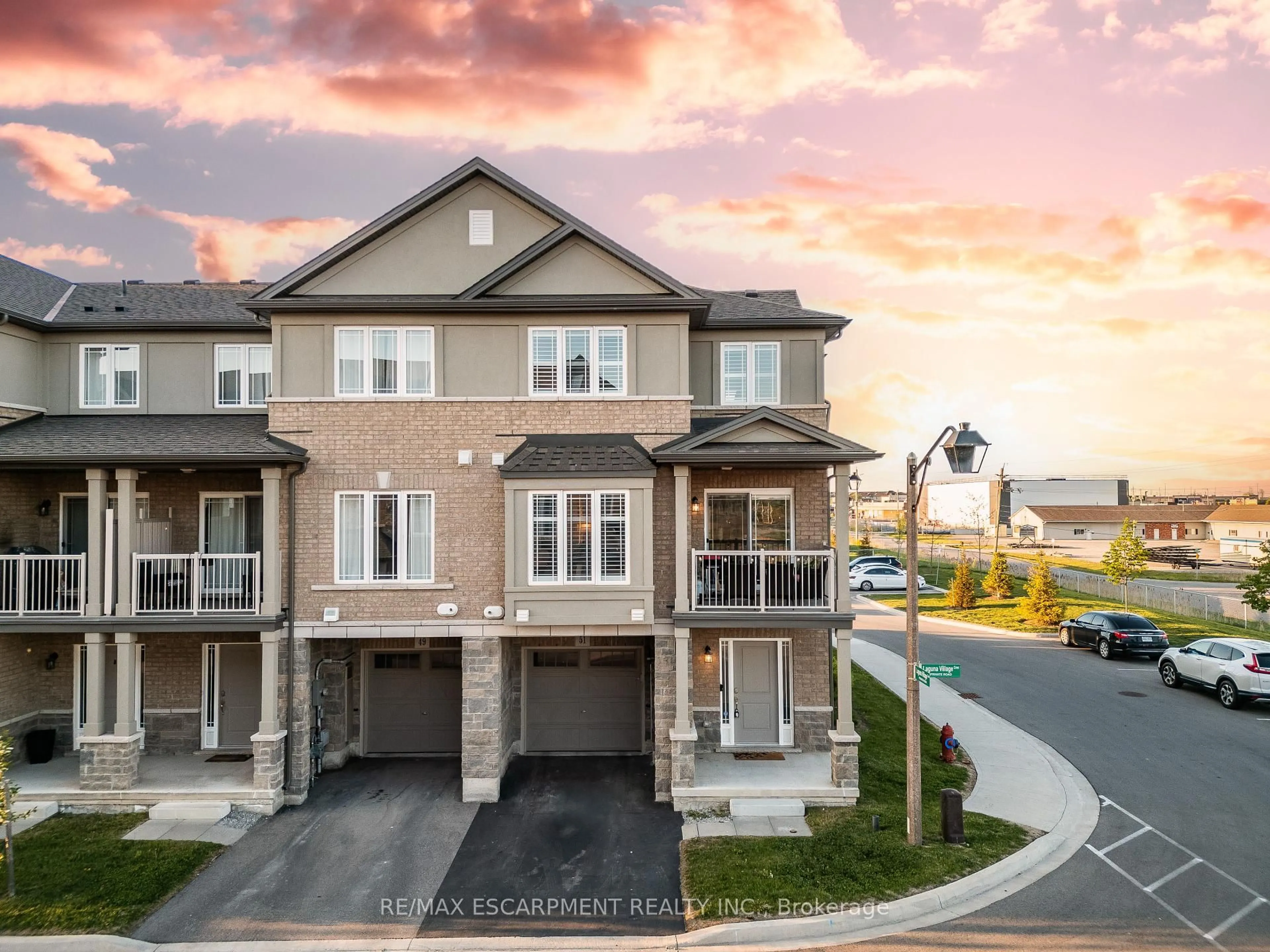 A pic from outside/outdoor area/front of a property/back of a property/a pic from drone, street for 51 Laguna Village Cres, Hamilton Ontario L0R 1P0