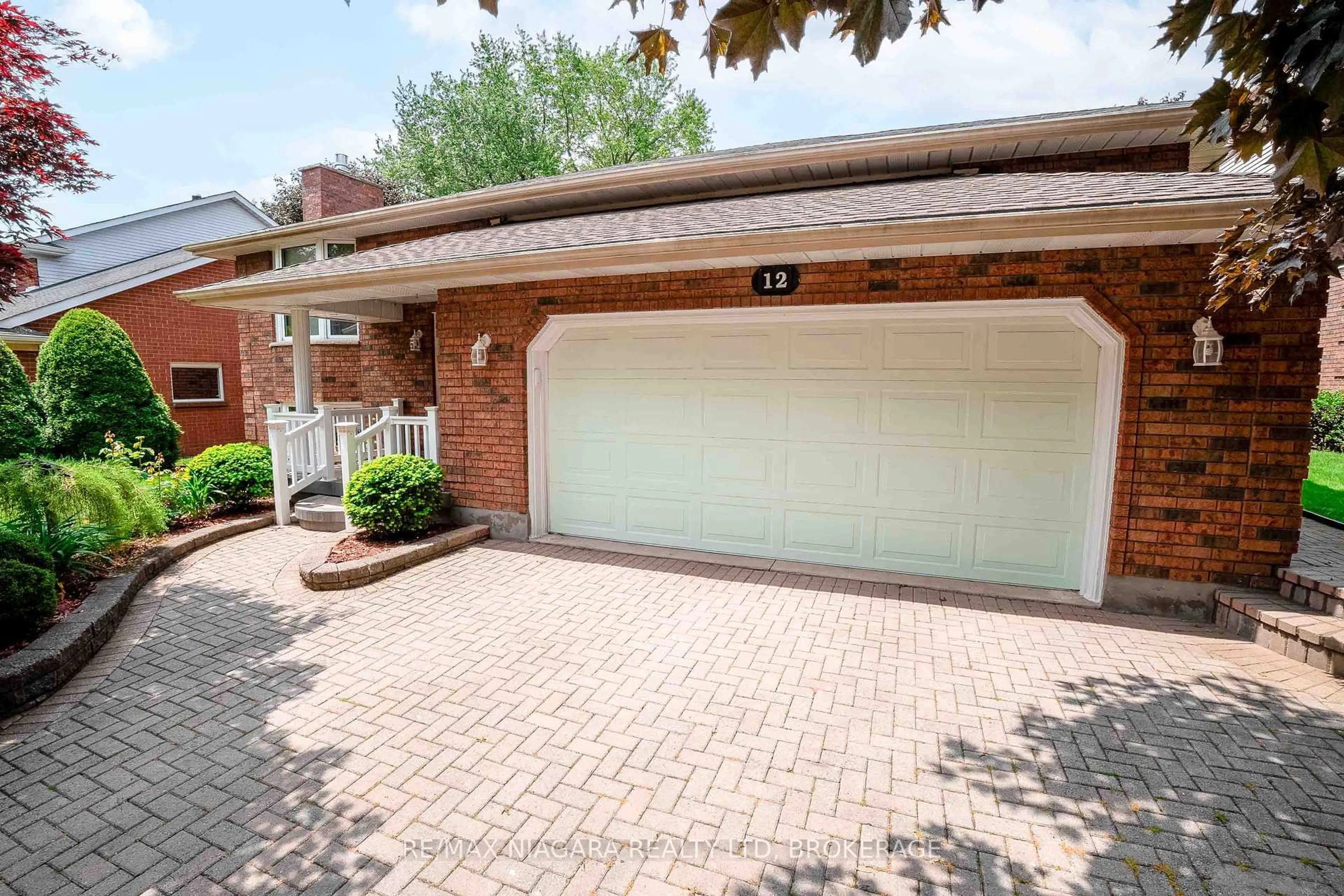 Home with brick exterior material, street for 12 Fern Gate, Pelham Ontario L0S 1E4