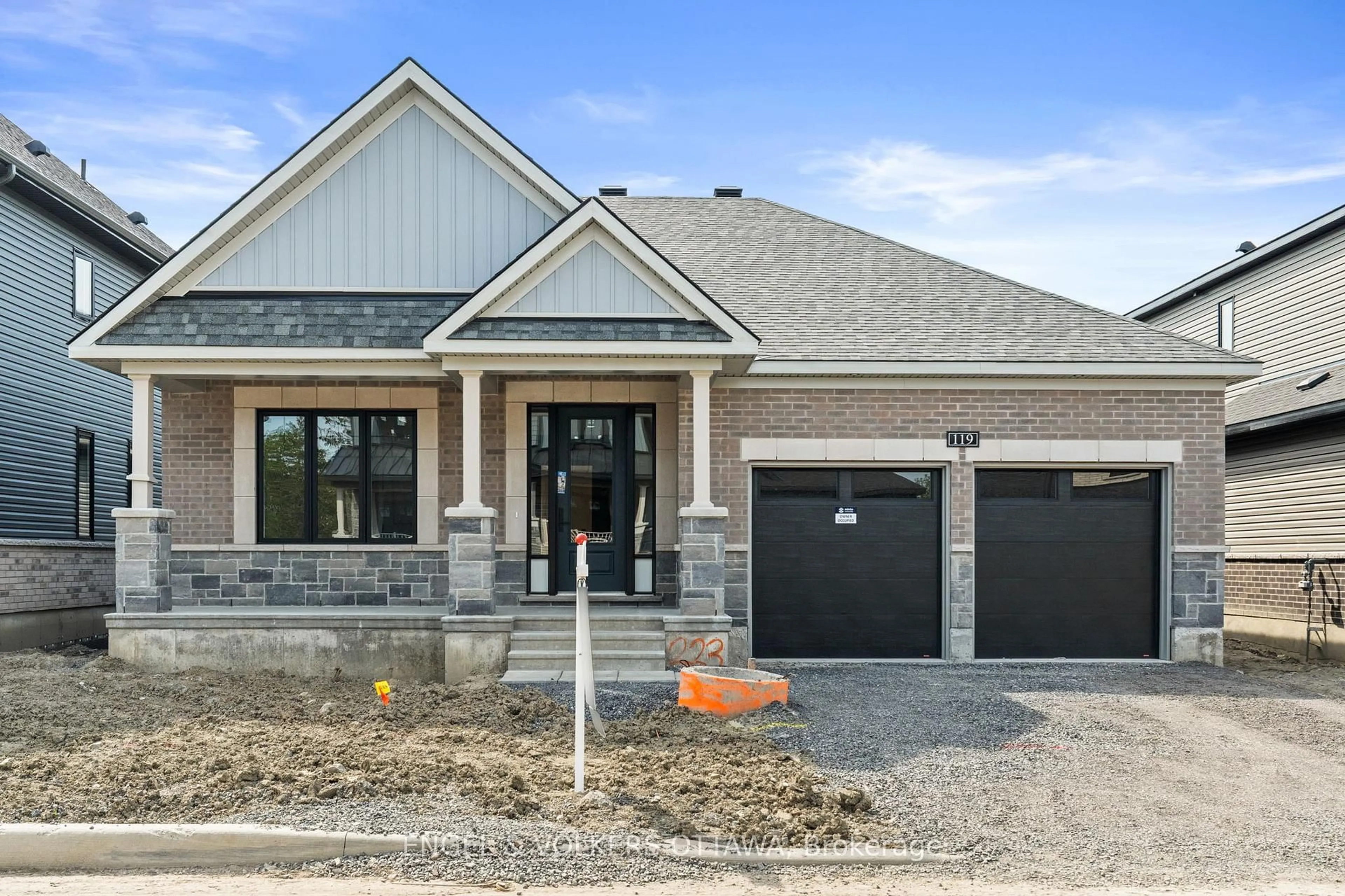 Home with brick exterior material, street for 119 D'arleux Pl, Manotick Ontario K4M 0M7