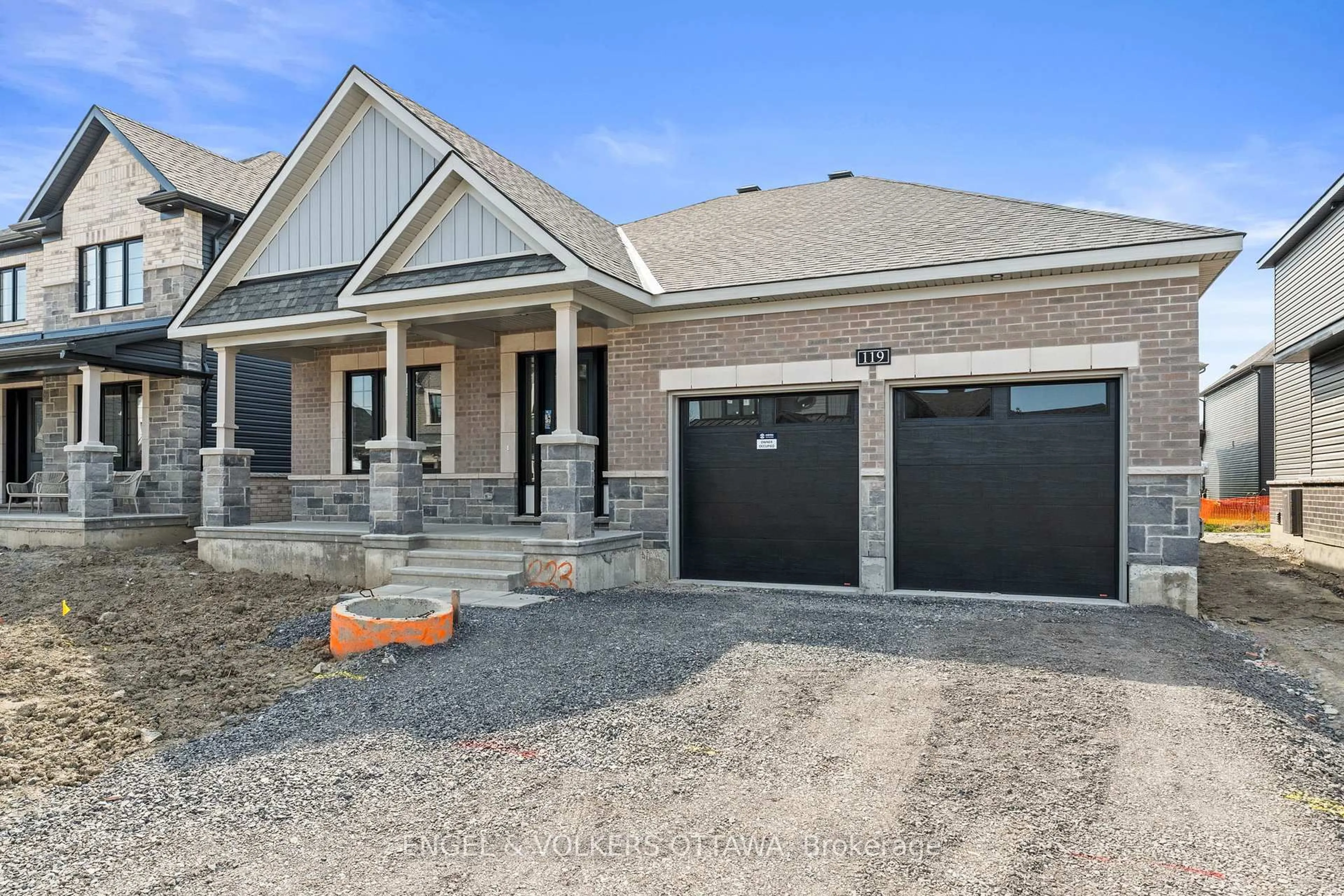 Home with brick exterior material, street for 119 D'arleux Pl, Manotick Ontario K4M 0M7