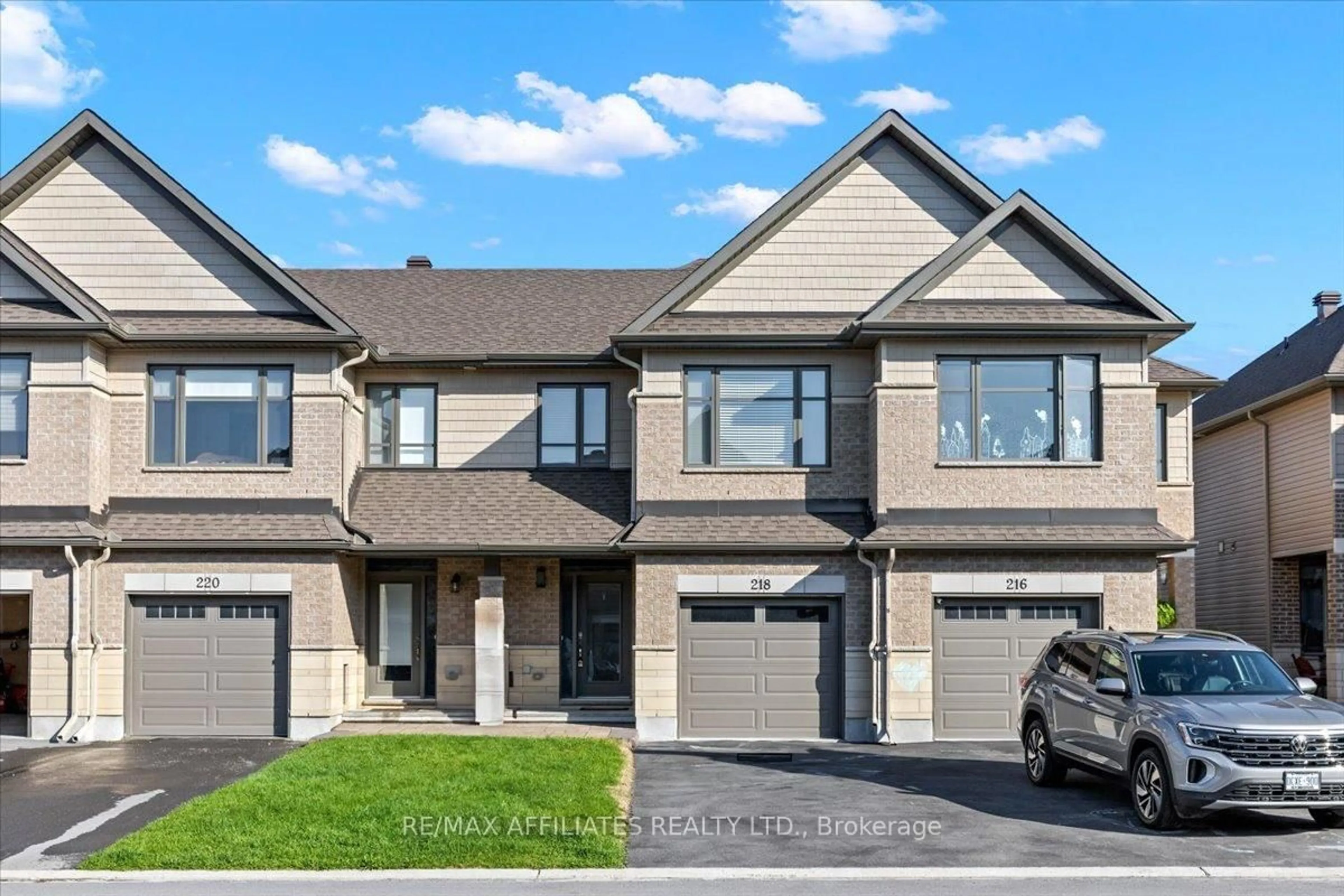 Home with brick exterior material, street for 218 Purchase Cres, Stittsville Ontario K2S 2L8