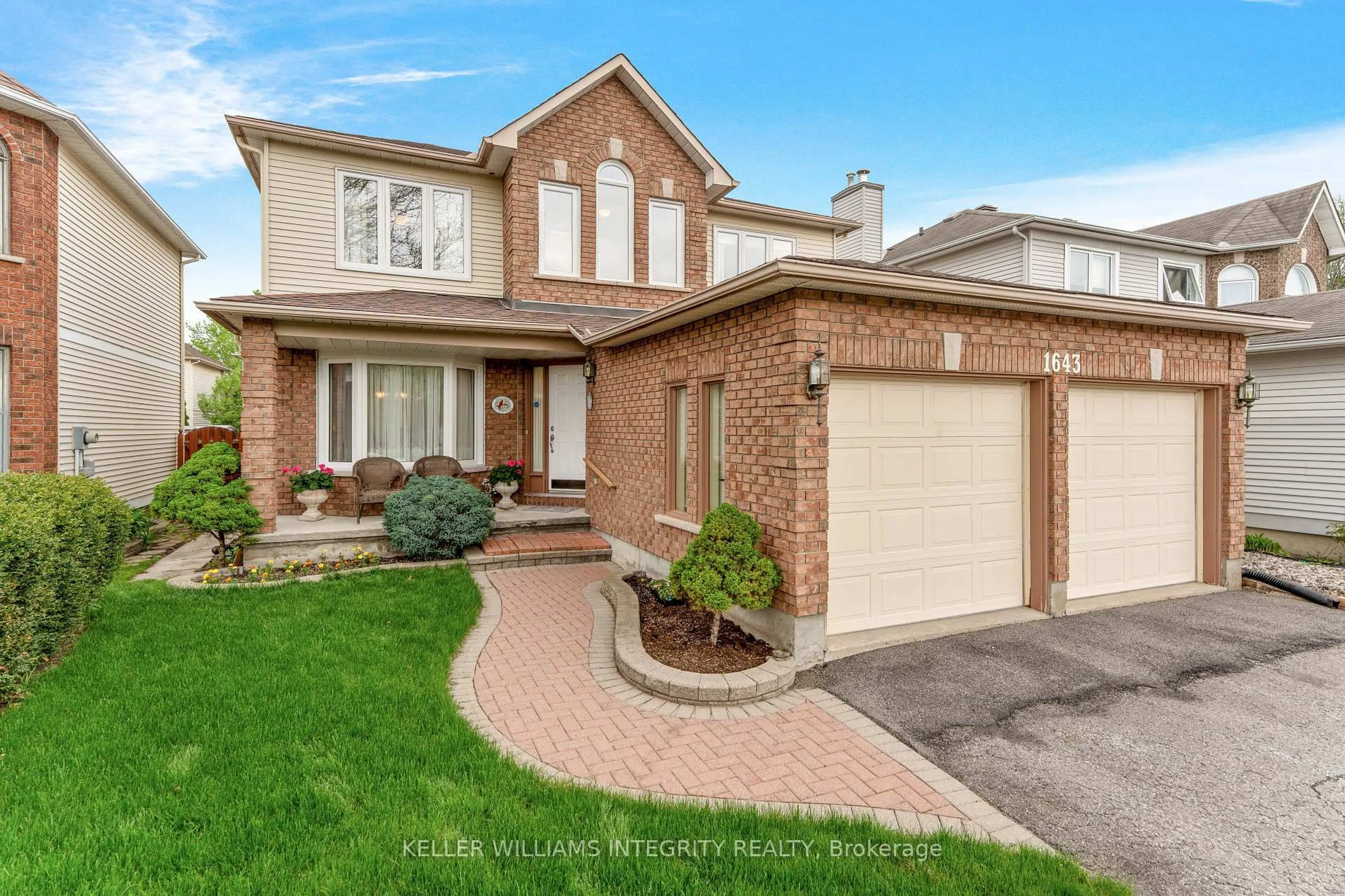 Home with brick exterior material, street for 1643 Blohm Dr, Ottawa Ontario K1G 5S4