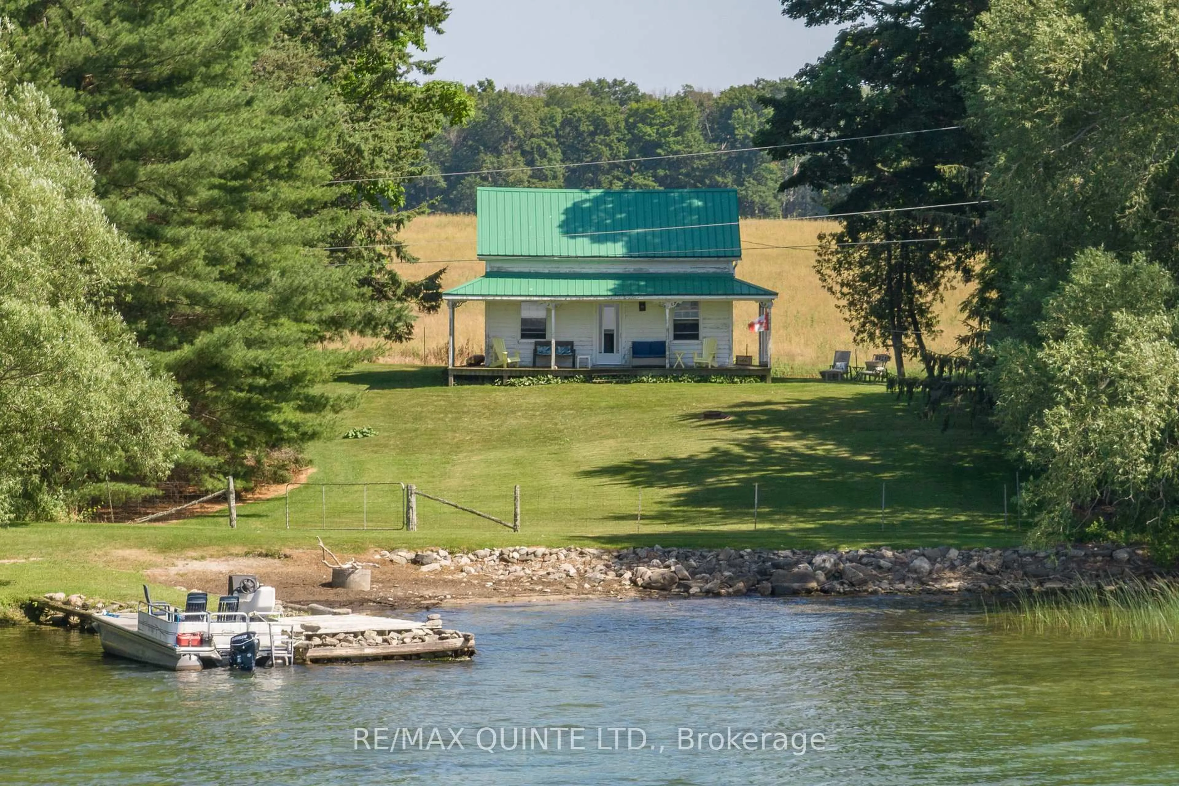 A pic from outside/outdoor area/front of a property/back of a property/a pic from drone, water/lake/river/ocean view for 562 WAUPOOS ISLAND Lane, Prince Edward County Ontario K0K 2T0