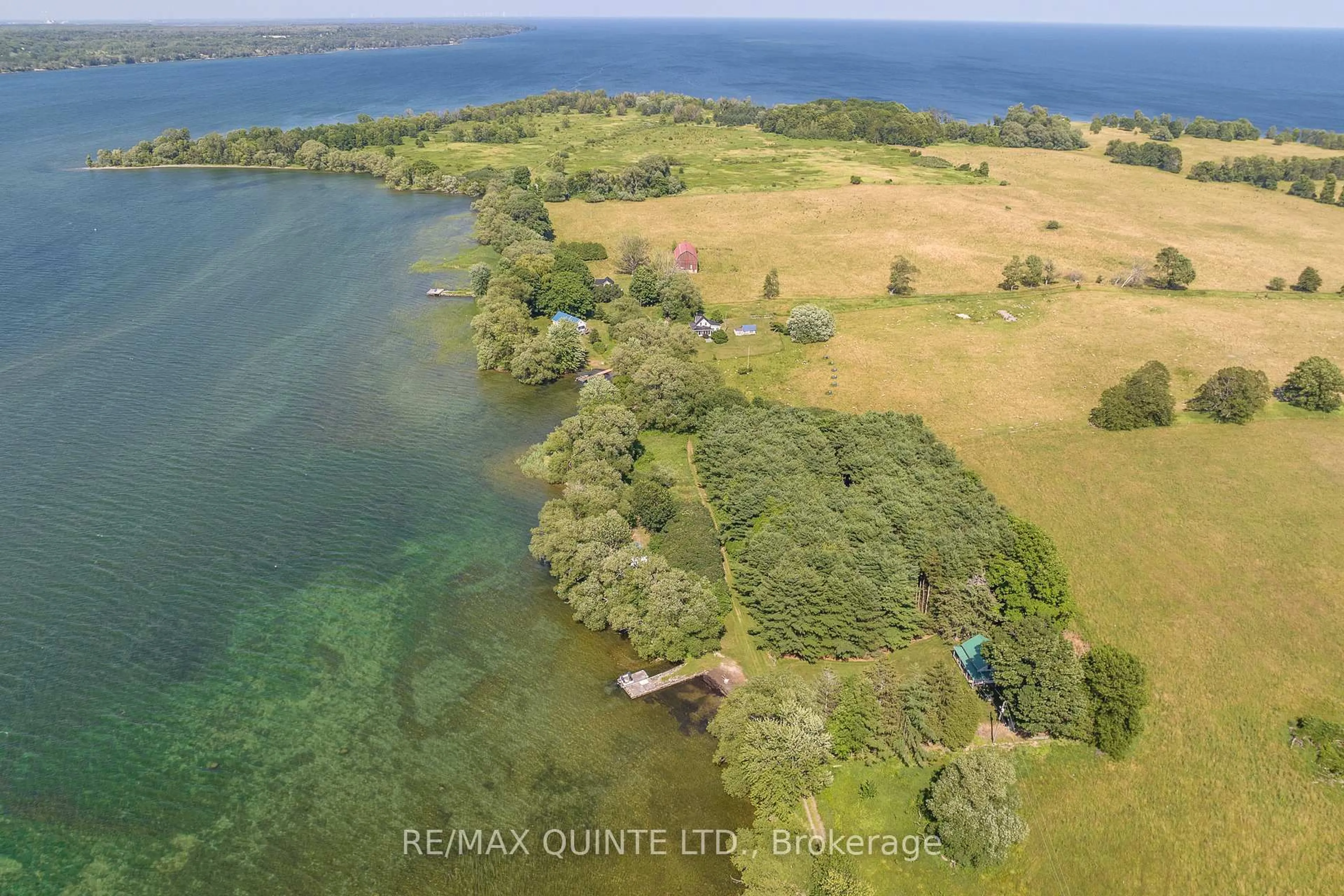 A pic from outside/outdoor area/front of a property/back of a property/a pic from drone, water/lake/river/ocean view for 562 WAUPOOS ISLAND Lane, Prince Edward County Ontario K0K 2T0