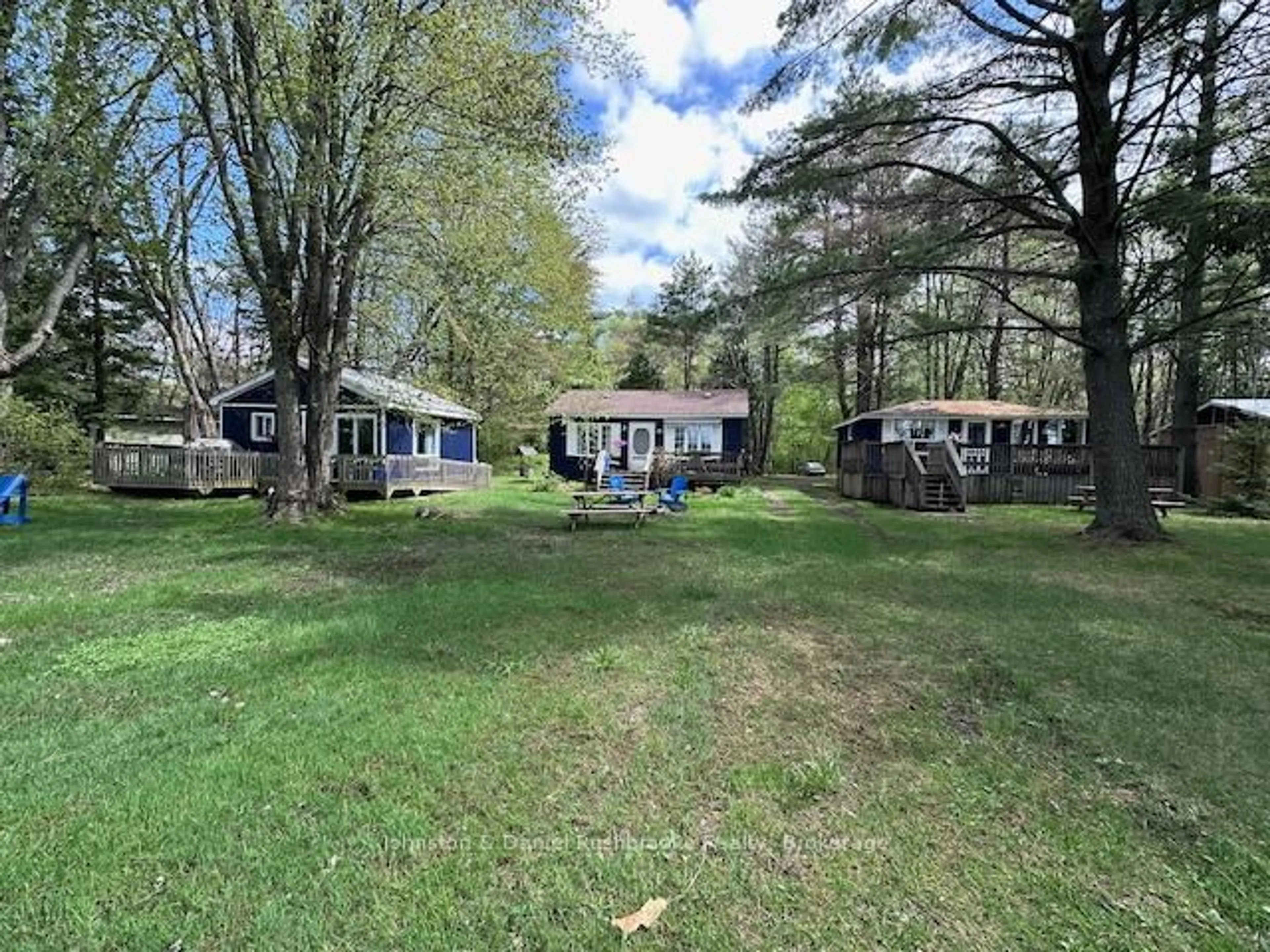A pic from outside/outdoor area/front of a property/back of a property/a pic from drone, water/lake/river/ocean view for 1039 Wonder Beach Rd, Muskoka Lakes Ontario P0B 1M0