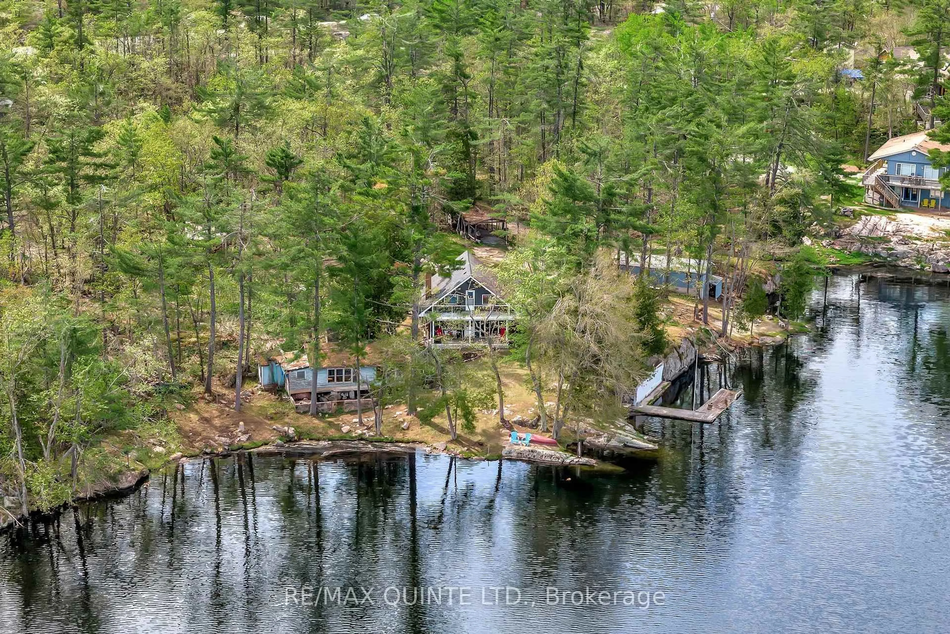 A pic from outside/outdoor area/front of a property/back of a property/a pic from drone, water/lake/river/ocean view for 2 Fire Route 2 Rte, Trent Lakes Ontario K0L 1J0