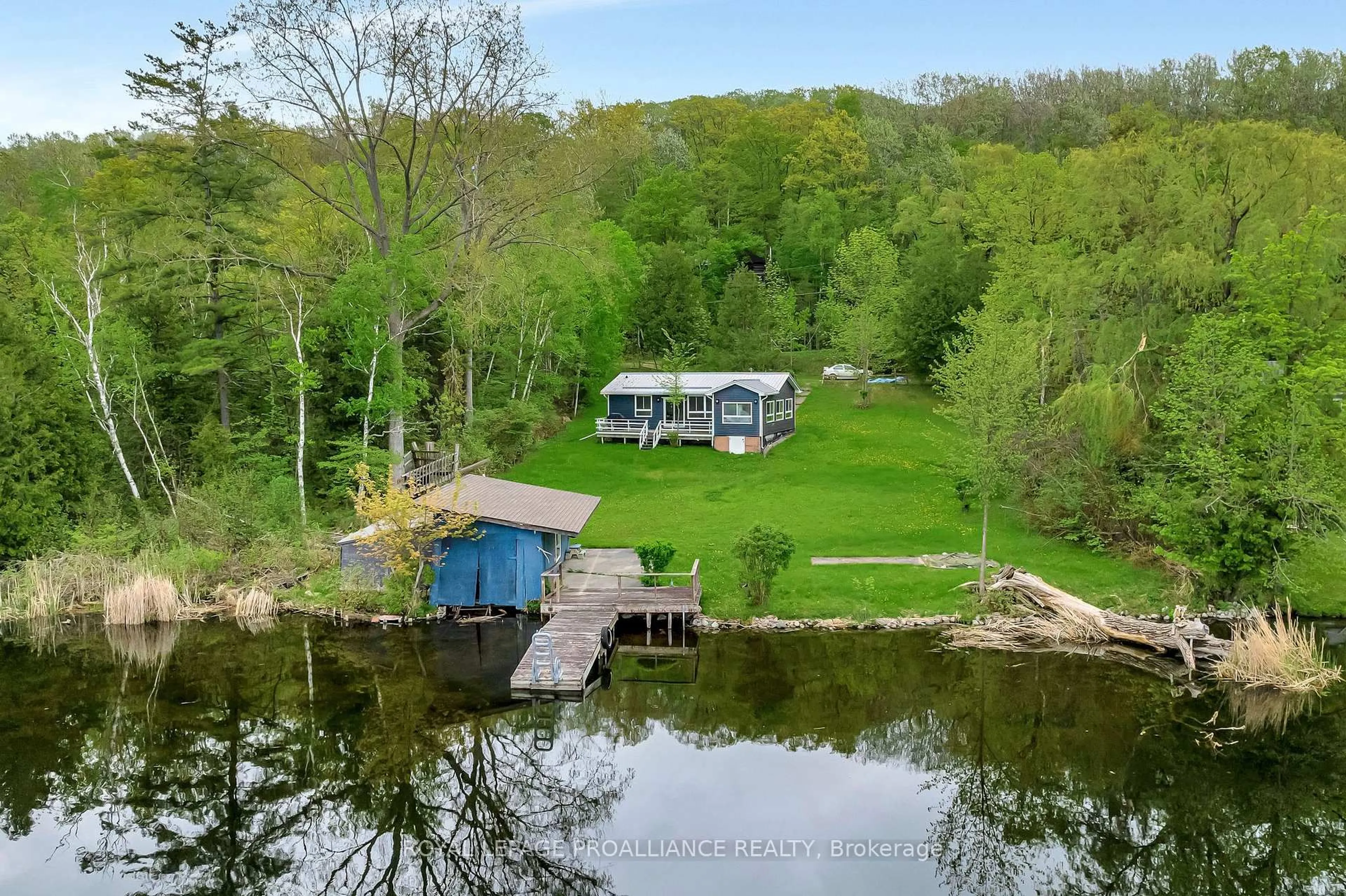A pic from outside/outdoor area/front of a property/back of a property/a pic from drone, water/lake/river/ocean view for 40 Cedar Lane, Hastings Ontario K0K 2C0
