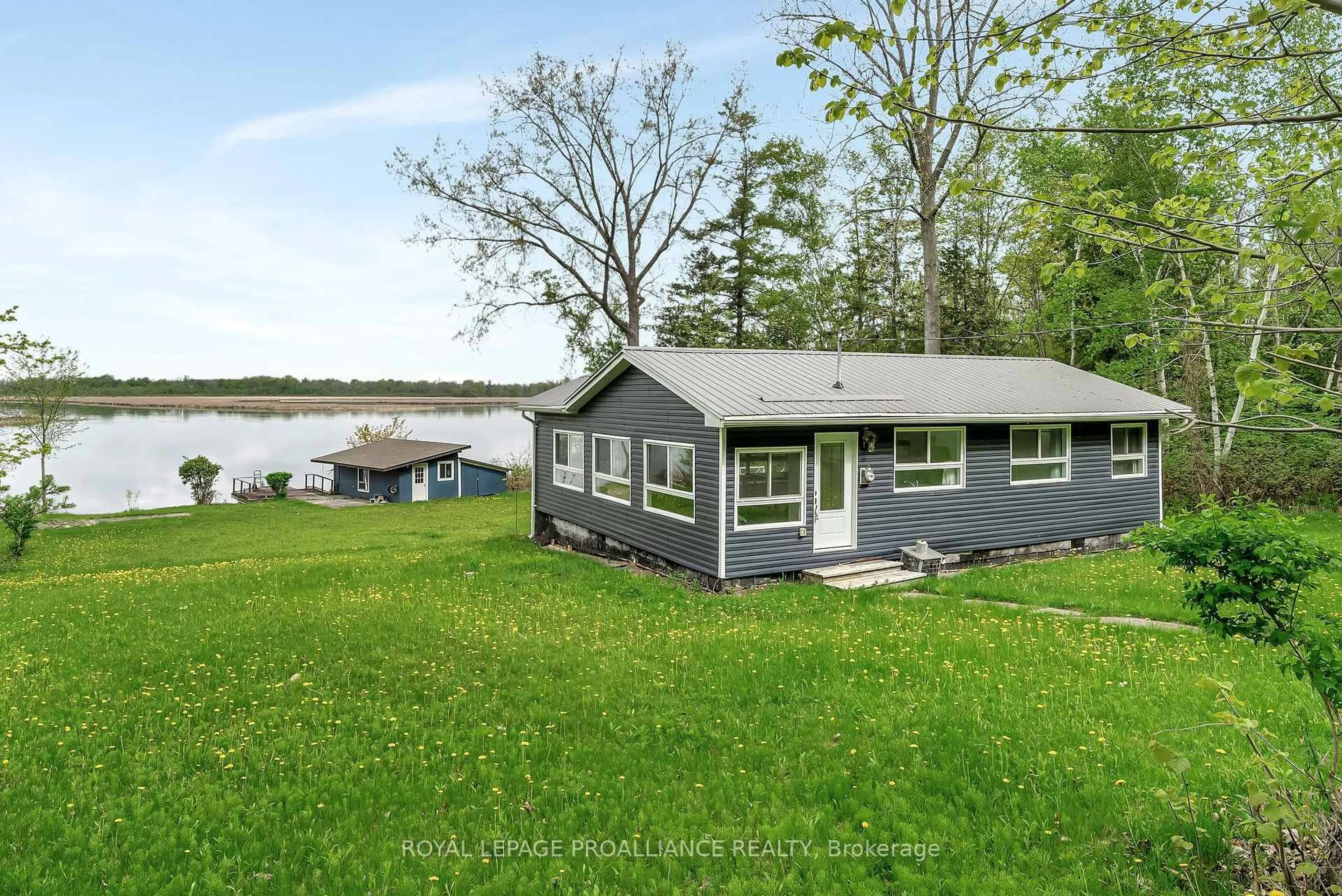A pic from outside/outdoor area/front of a property/back of a property/a pic from drone, water/lake/river/ocean view for 40 Cedar Lane, Hastings Ontario K0K 2C0