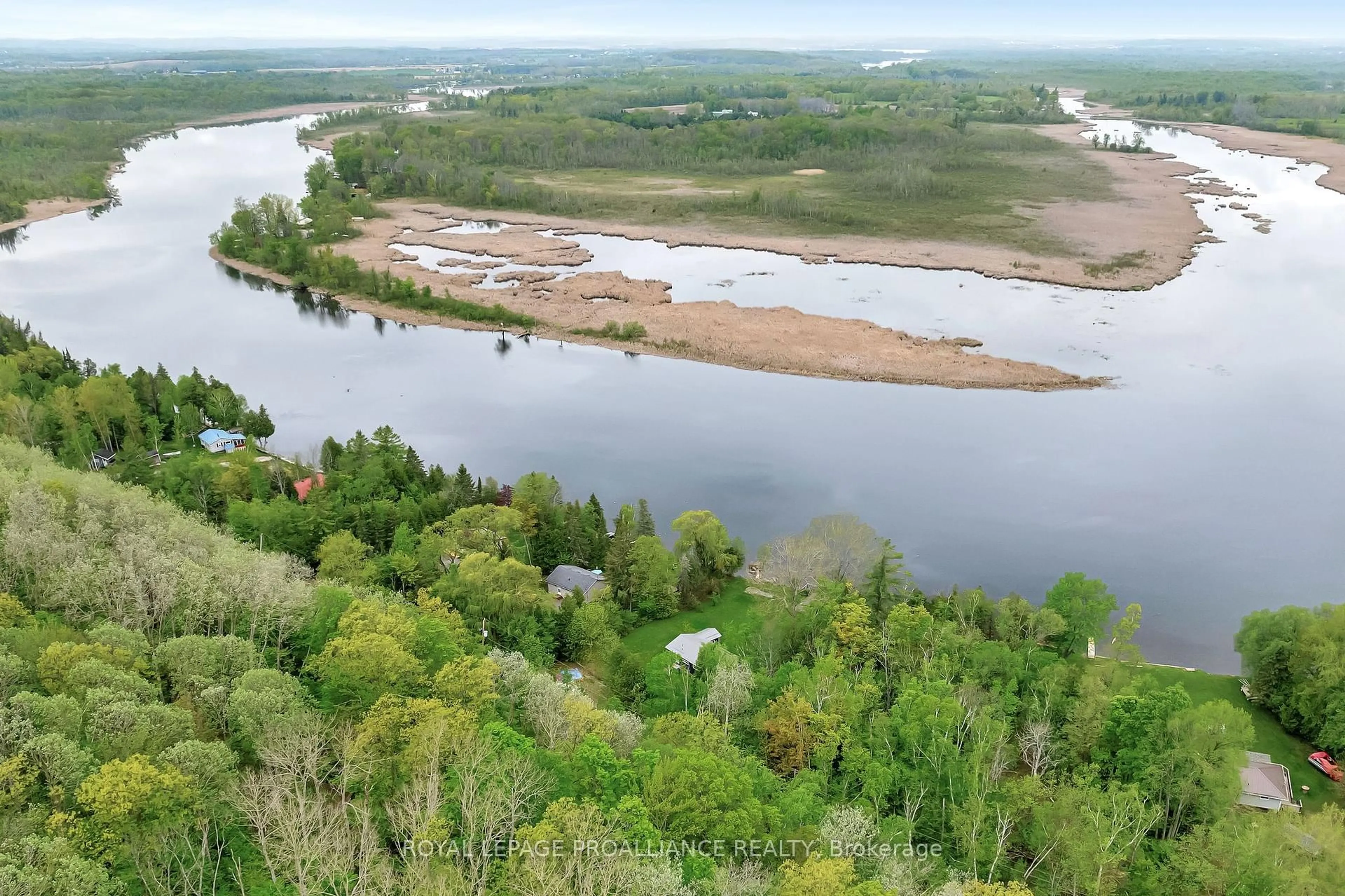 A pic from outside/outdoor area/front of a property/back of a property/a pic from drone, water/lake/river/ocean view for 40 Cedar Lane, Hastings Ontario K0K 2C0