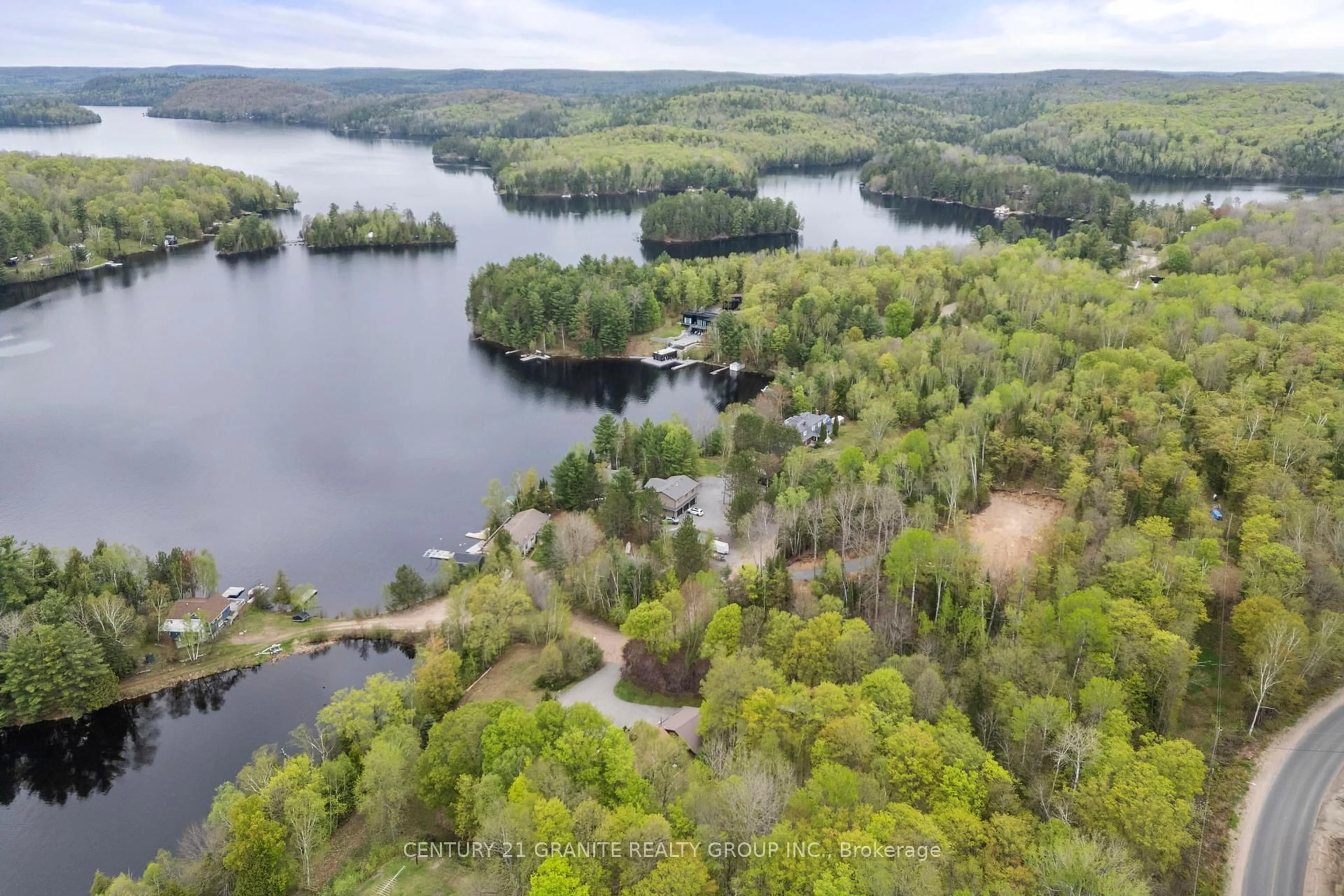 A pic from outside/outdoor area/front of a property/back of a property/a pic from drone, water/lake/river/ocean view for 61 Wykes Rd, Bancroft Ontario K0L 1C0