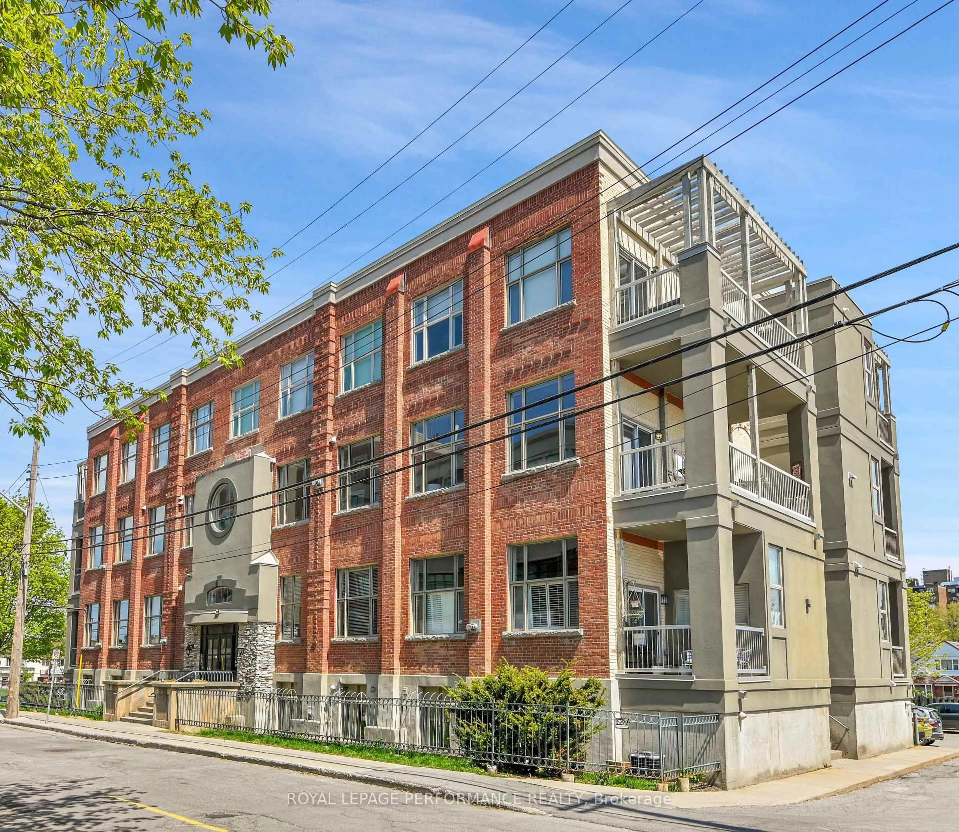 Home with brick exterior material, building for 297 Dupuis St #205, Ottawa Ontario K1L 7H8