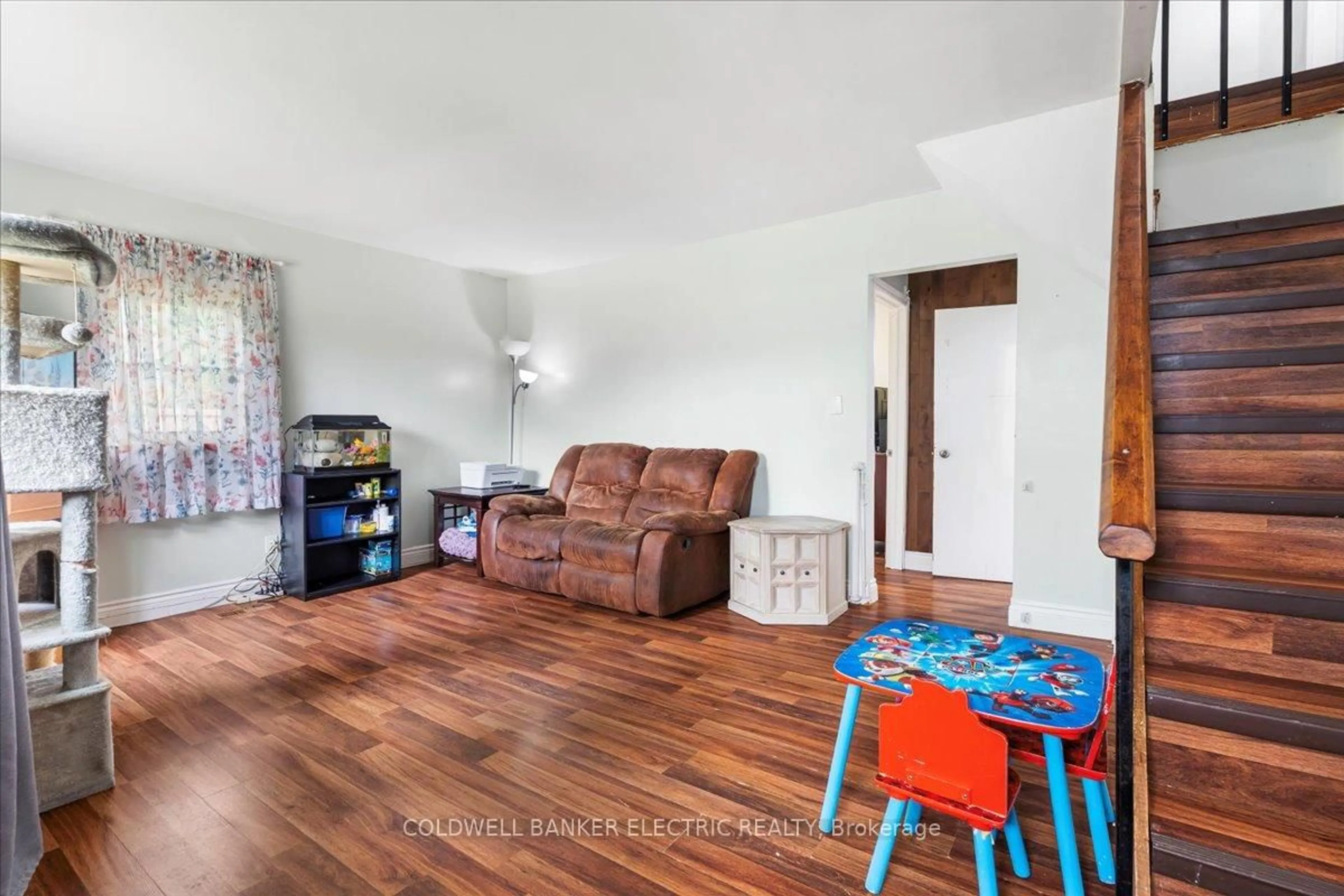 Living room with furniture, wood/laminate floor for 205 Wallace St, Trent Hills Ontario K0L 1L0
