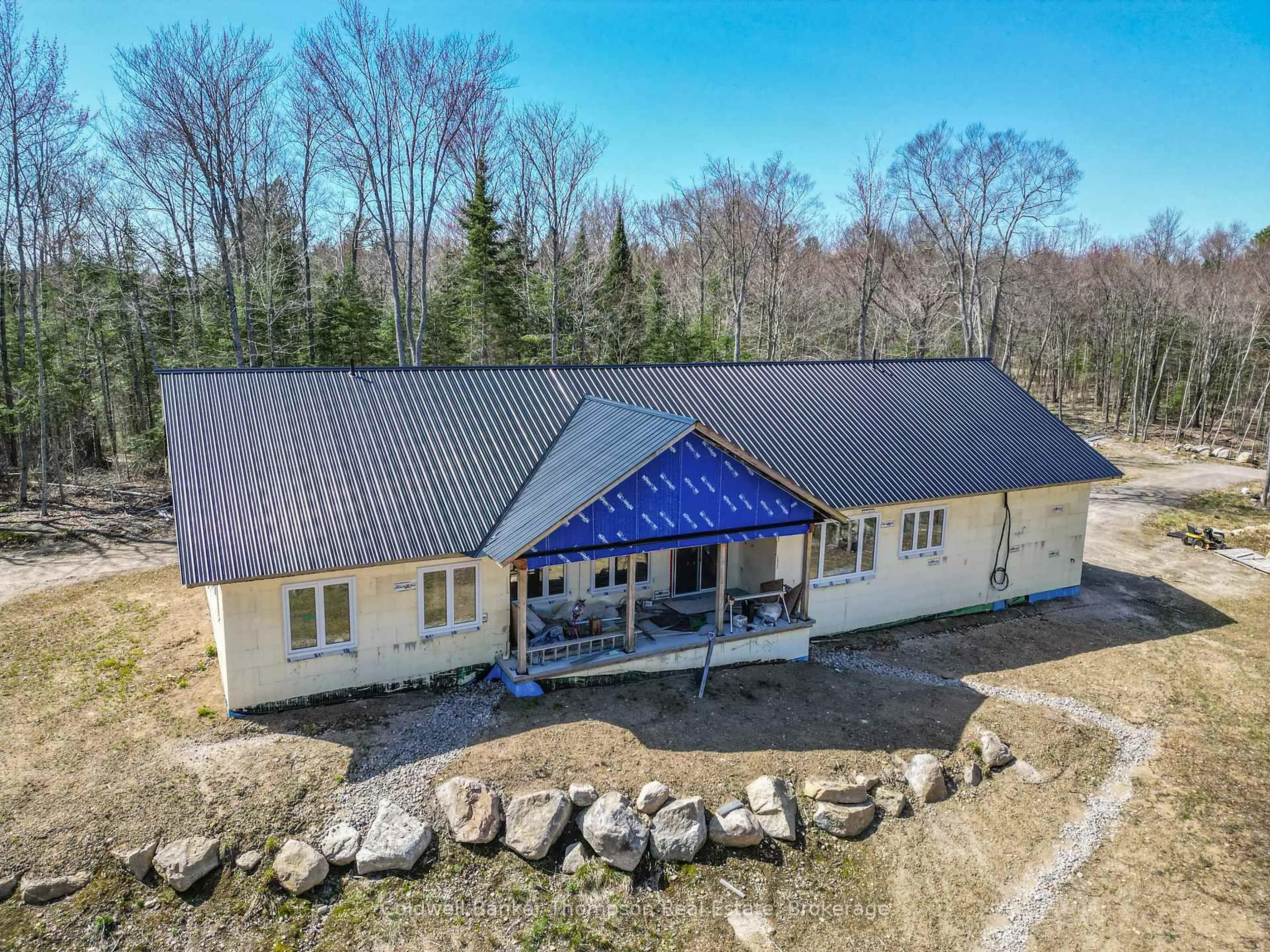 A pic from outside/outdoor area/front of a property/back of a property/a pic from drone, building for 121 Loon Lake Rd, Magnetawan Ontario P0A 1Z0