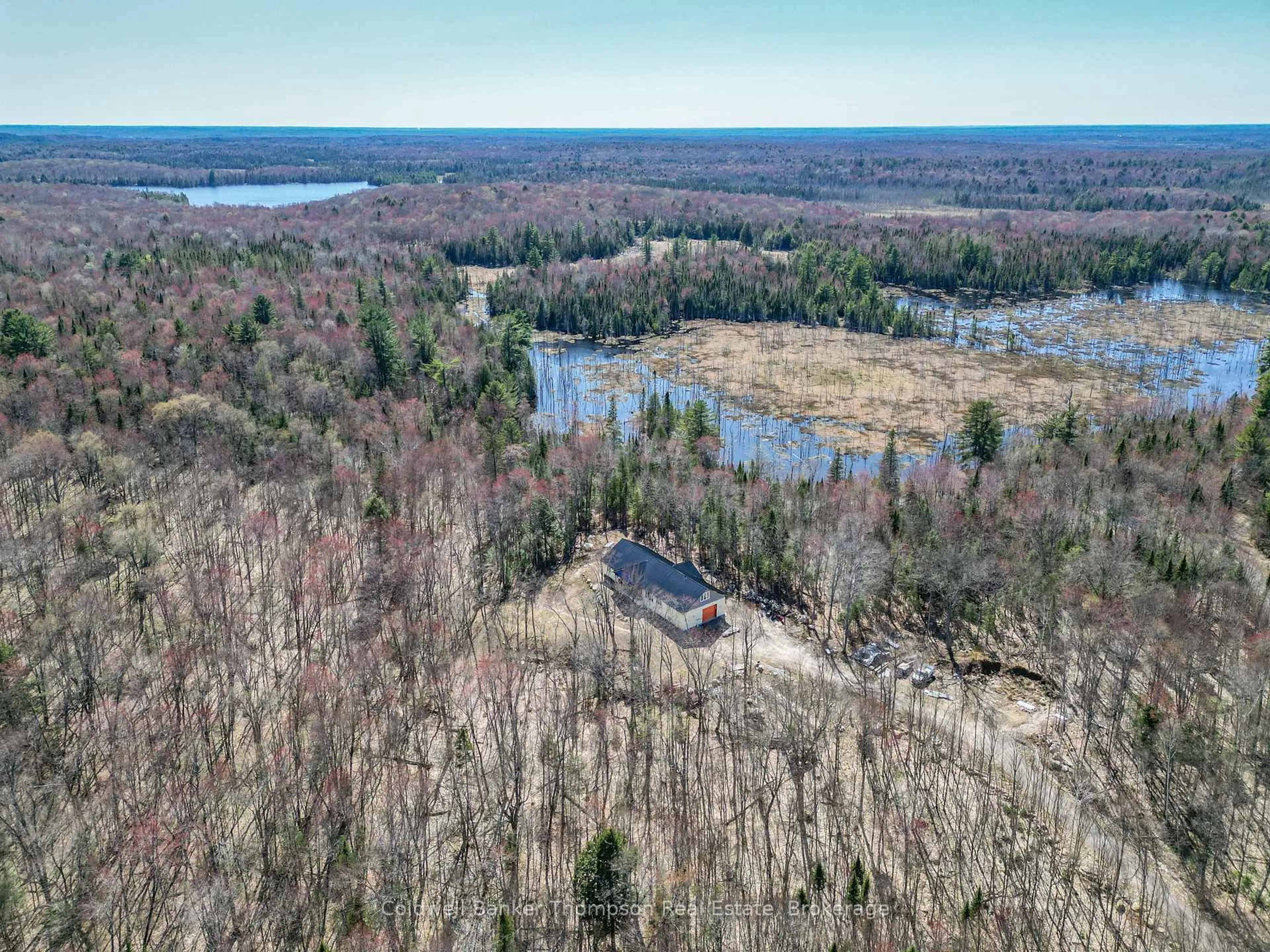 A pic from outside/outdoor area/front of a property/back of a property/a pic from drone, water/lake/river/ocean view for 121 Loon Lake Rd, Magnetawan Ontario P0A 1Z0