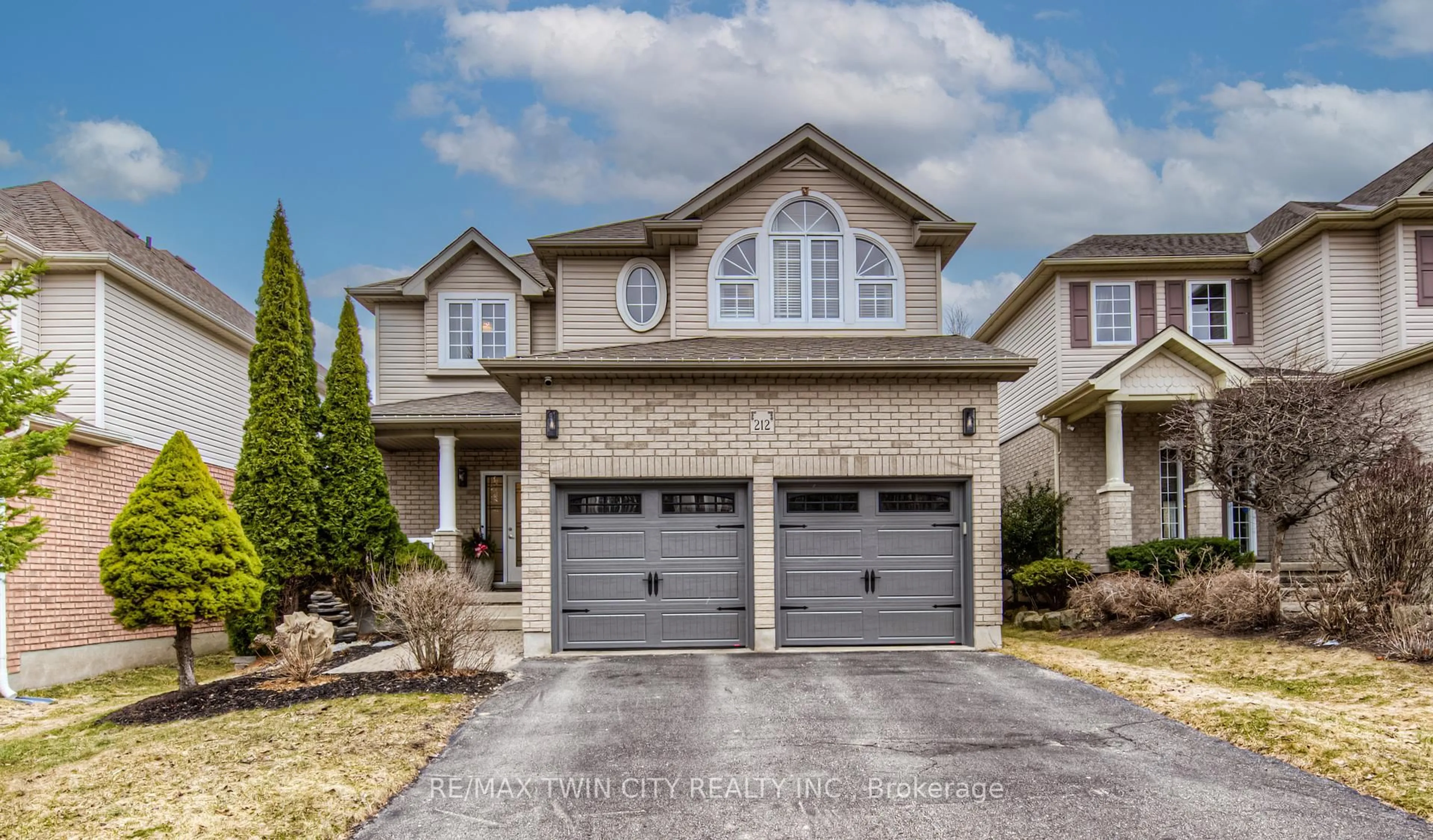 Home with brick exterior material, street for 212 Doon Dr, Kitchener Ontario N2P 2L8