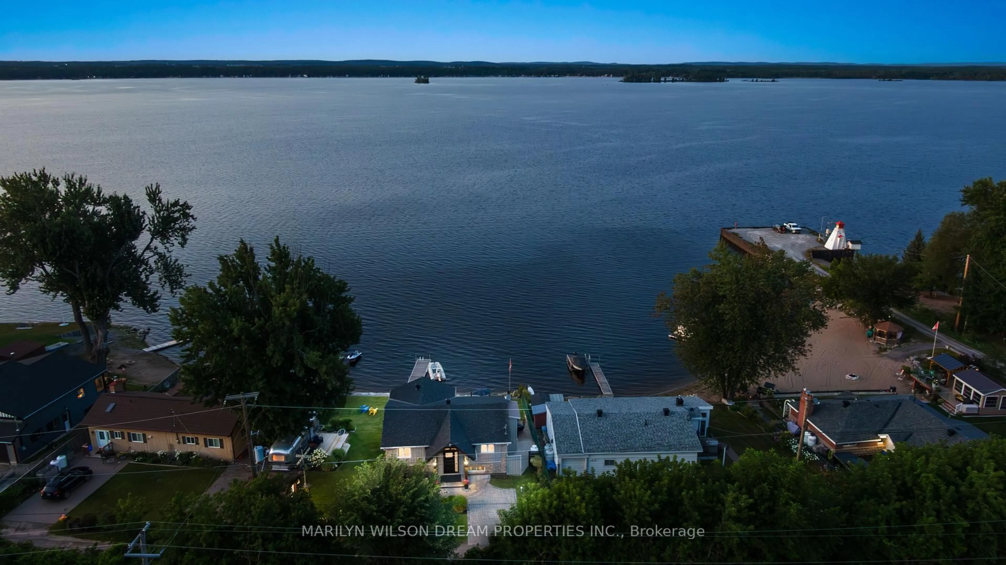 A pic from outside/outdoor area/front of a property/back of a property/a pic from drone, water/lake/river/ocean view for 614 Lake St, Renfrew Ontario K7V 3Z8