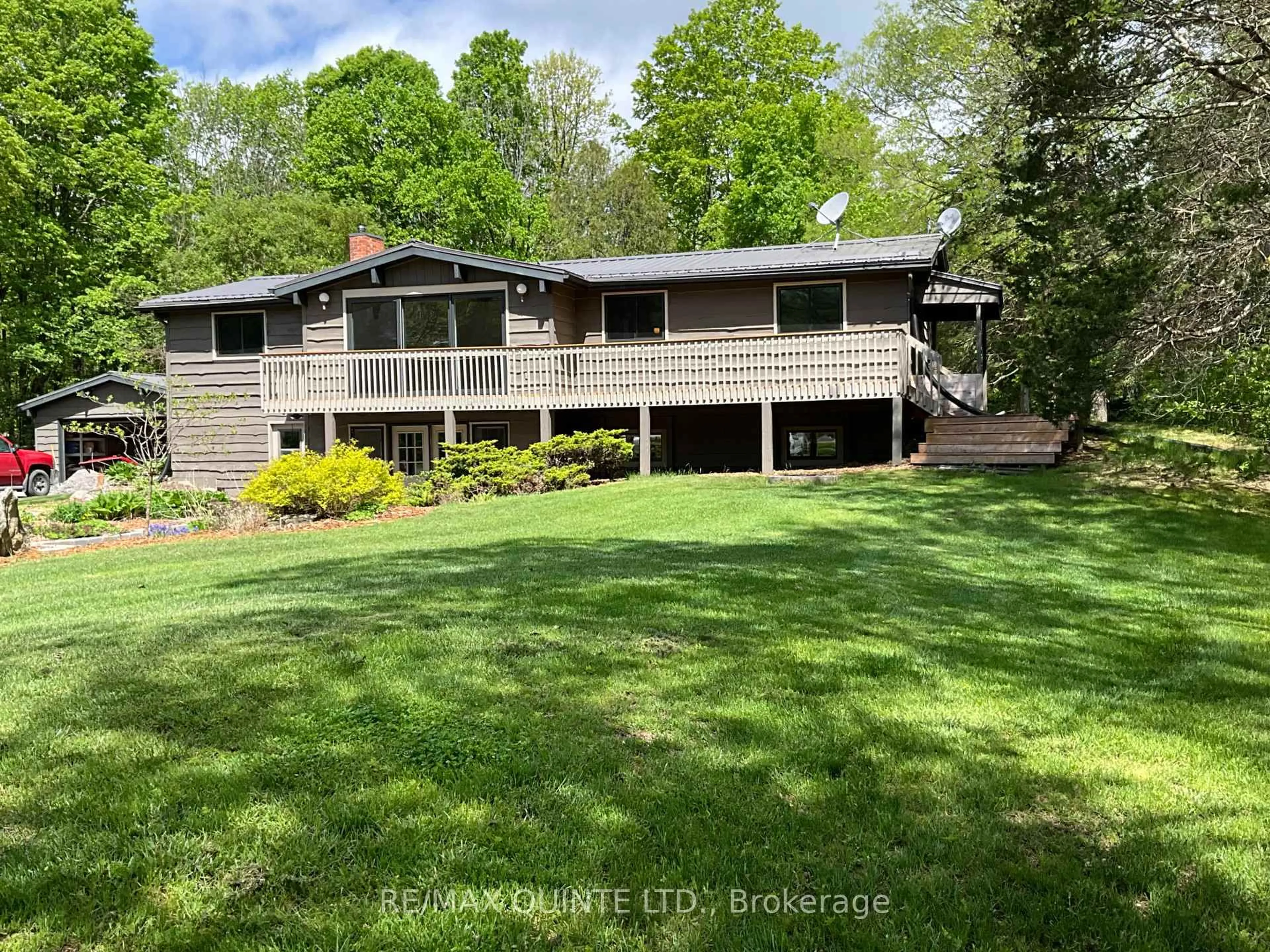A pic from outside/outdoor area/front of a property/back of a property/a pic from drone, water/lake/river/ocean view for 405 Scuttlehole Rd, Belleville Ontario K0K 2V0
