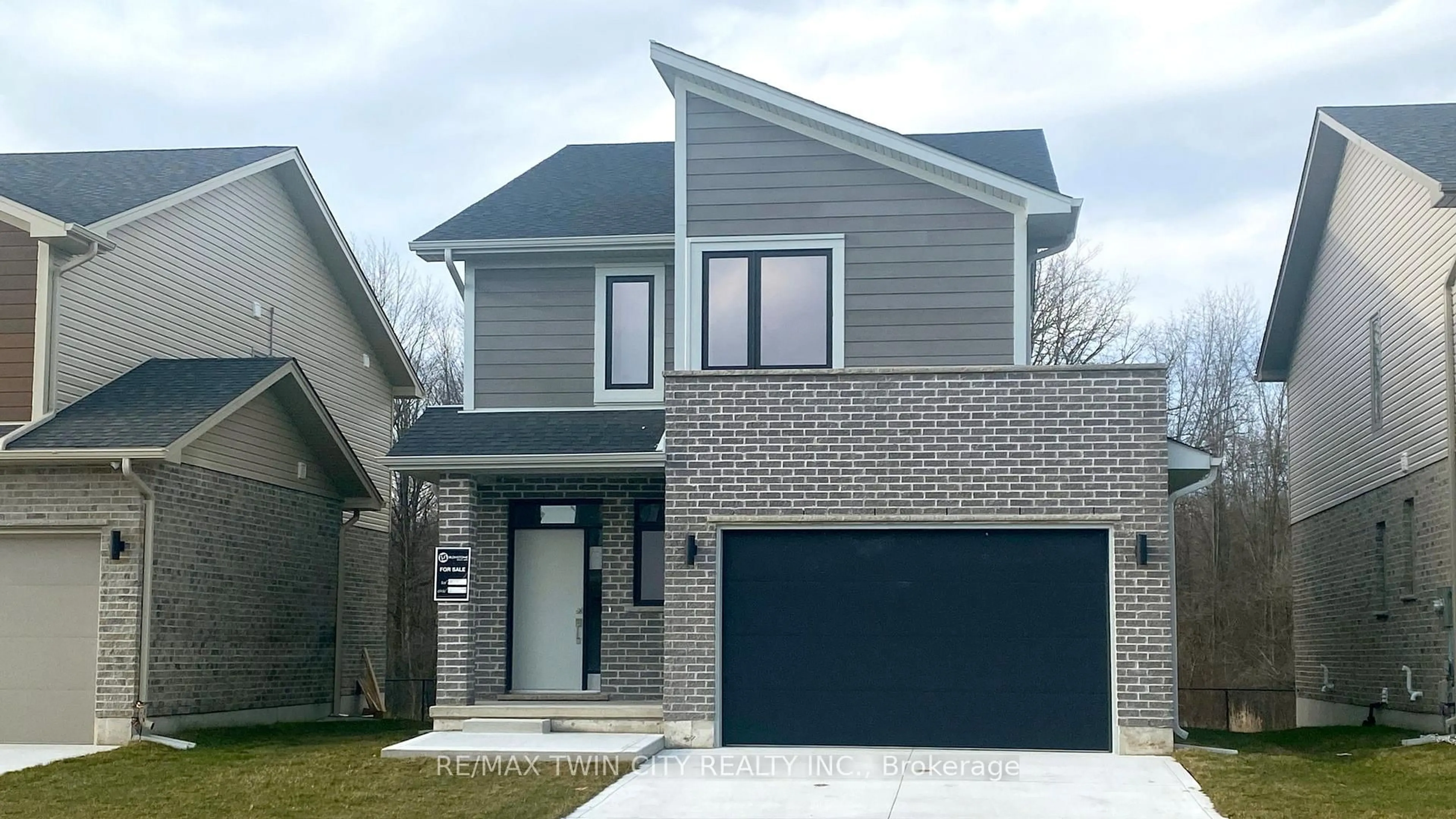 Home with brick exterior material, street for 2024 Evans Blvd, London South Ontario N6M 0J6