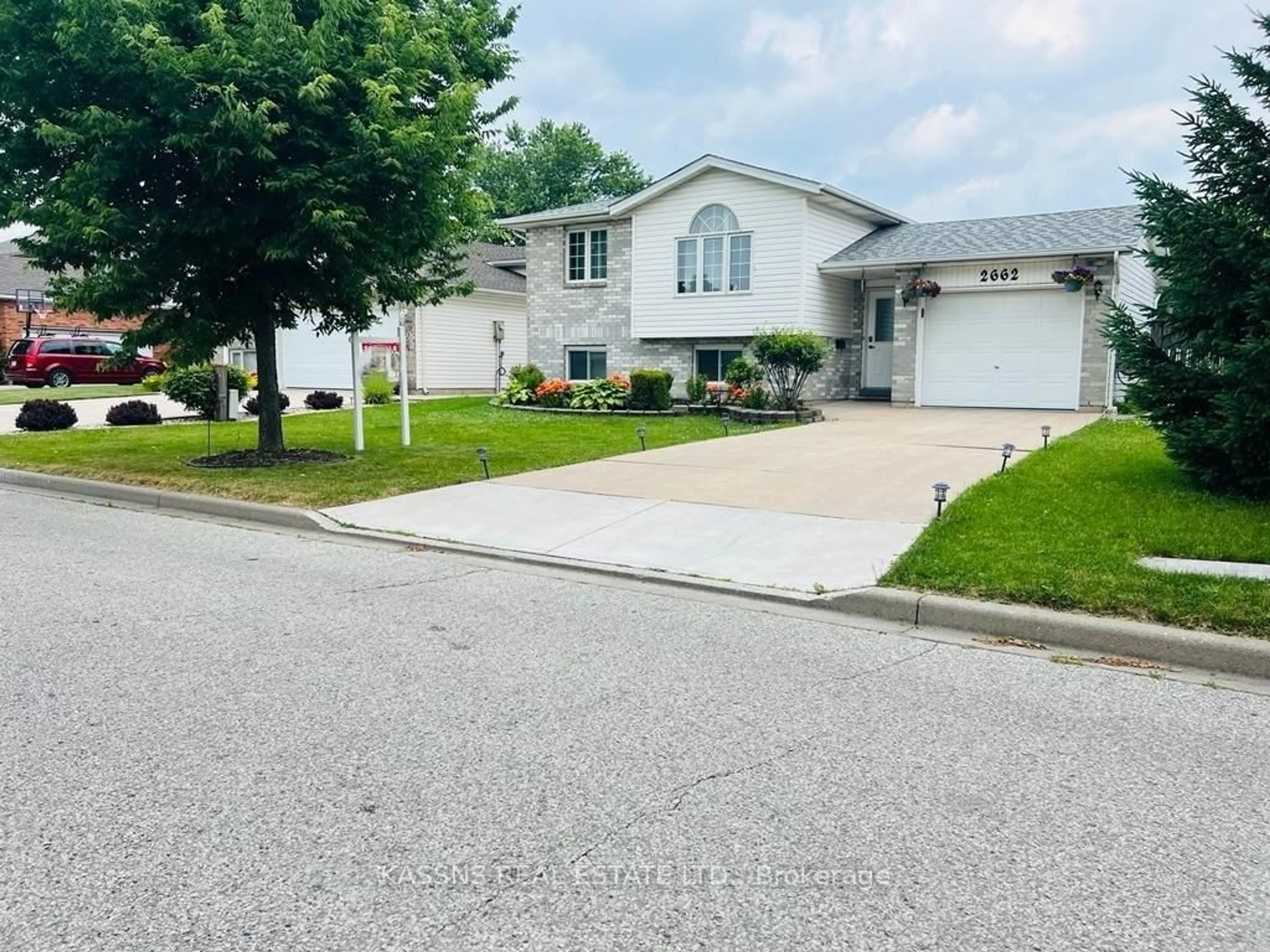 Home with vinyl exterior material, street for 2662 Cappelletto Rd, Windsor Ontario N8W 5M9
