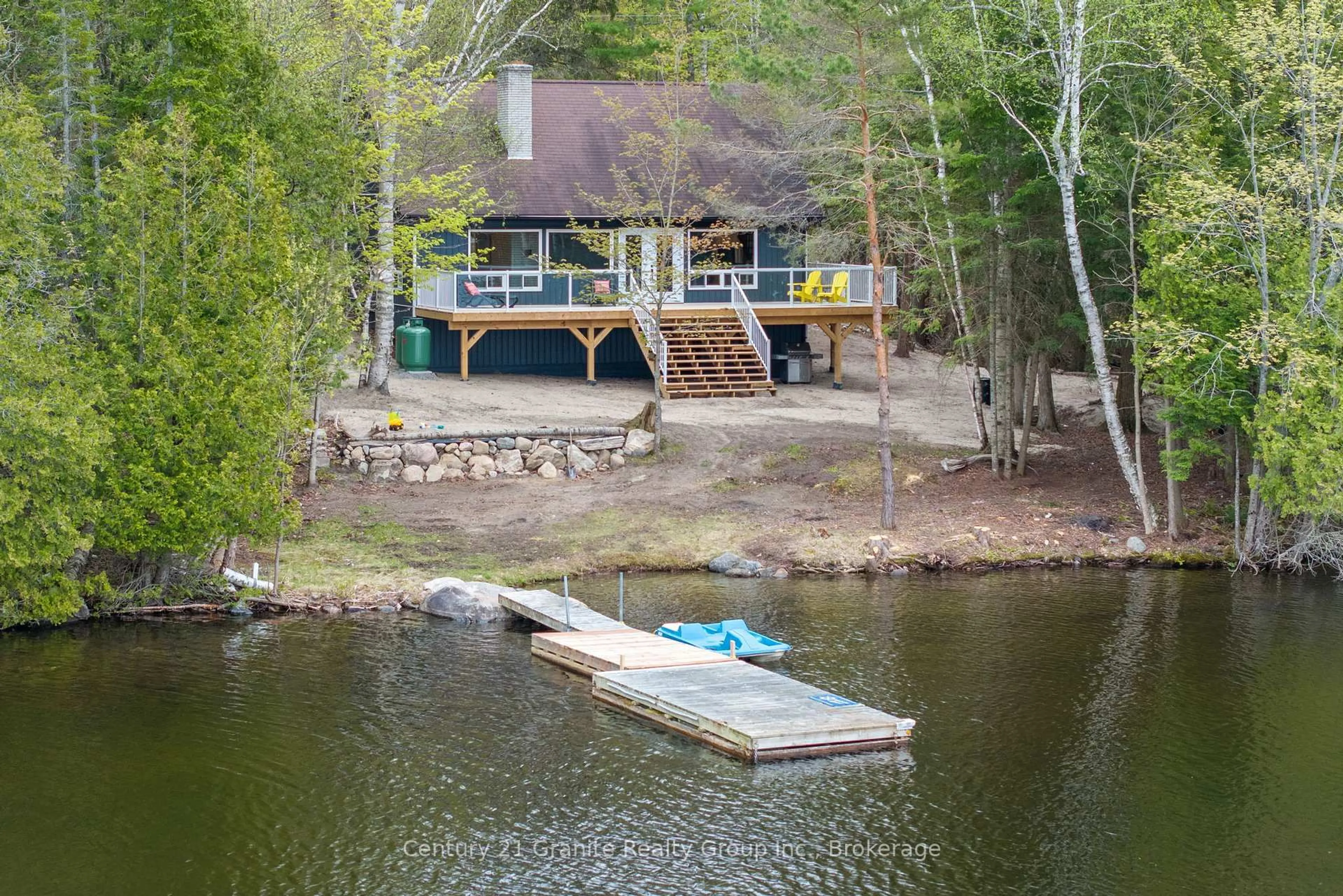 A pic from outside/outdoor area/front of a property/back of a property/a pic from drone, water/lake/river/ocean view for 2347 Kashagawigamog Lake Rd, Minden Hills Ontario K0M 2K0
