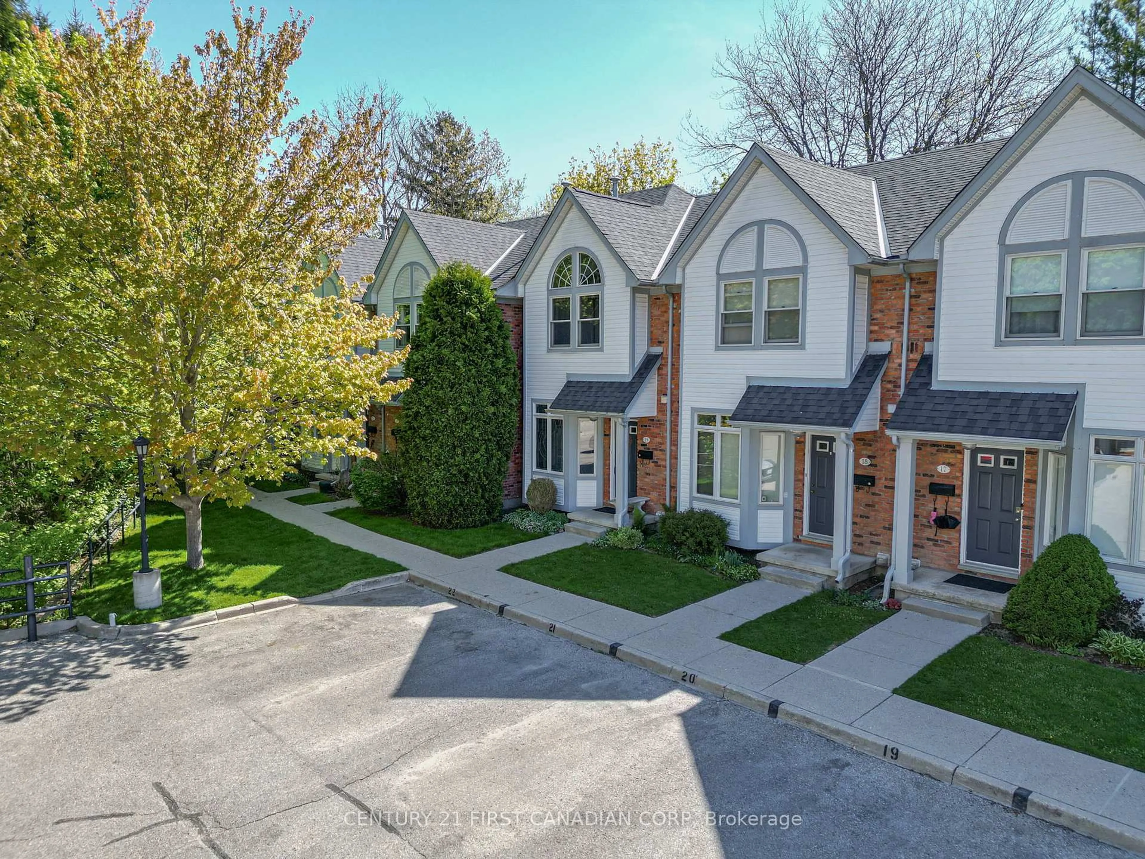 A pic from outside/outdoor area/front of a property/back of a property/a pic from drone, street for 1415 Commissioners Rd #19, London South Ontario N6K 1E2