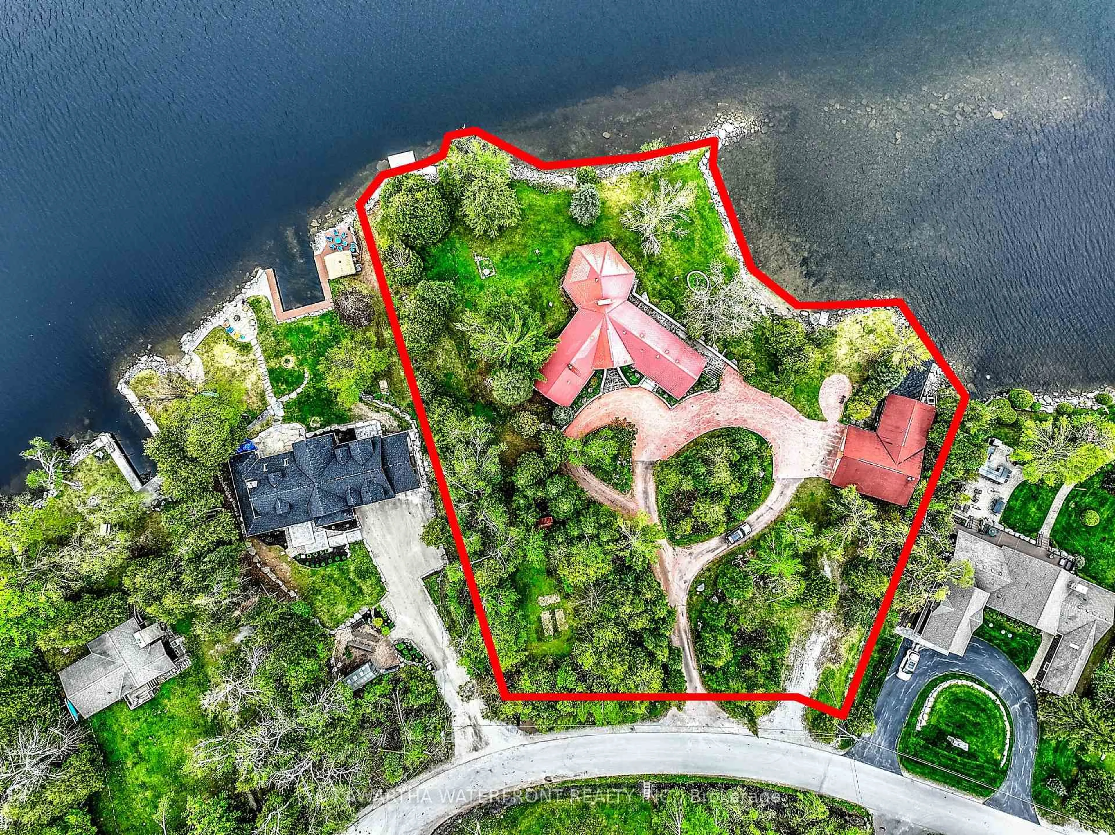 A pic from outside/outdoor area/front of a property/back of a property/a pic from drone, water/lake/river/ocean view for 557 Riverside Dr, Trent Lakes Ontario K0M 1A0