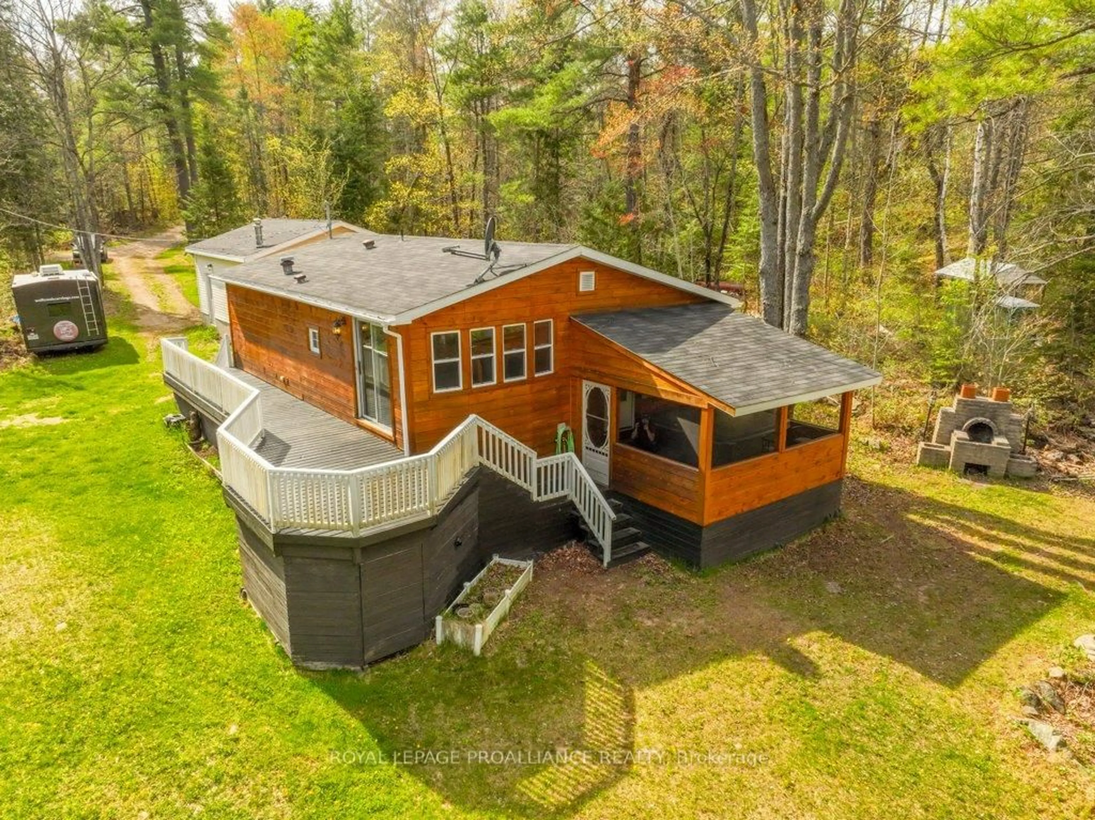 A pic from outside/outdoor area/front of a property/back of a property/a pic from drone, water/lake/river/ocean view for 1058 Jacques Bay Rd, Cloyne Ontario K0H 1K0