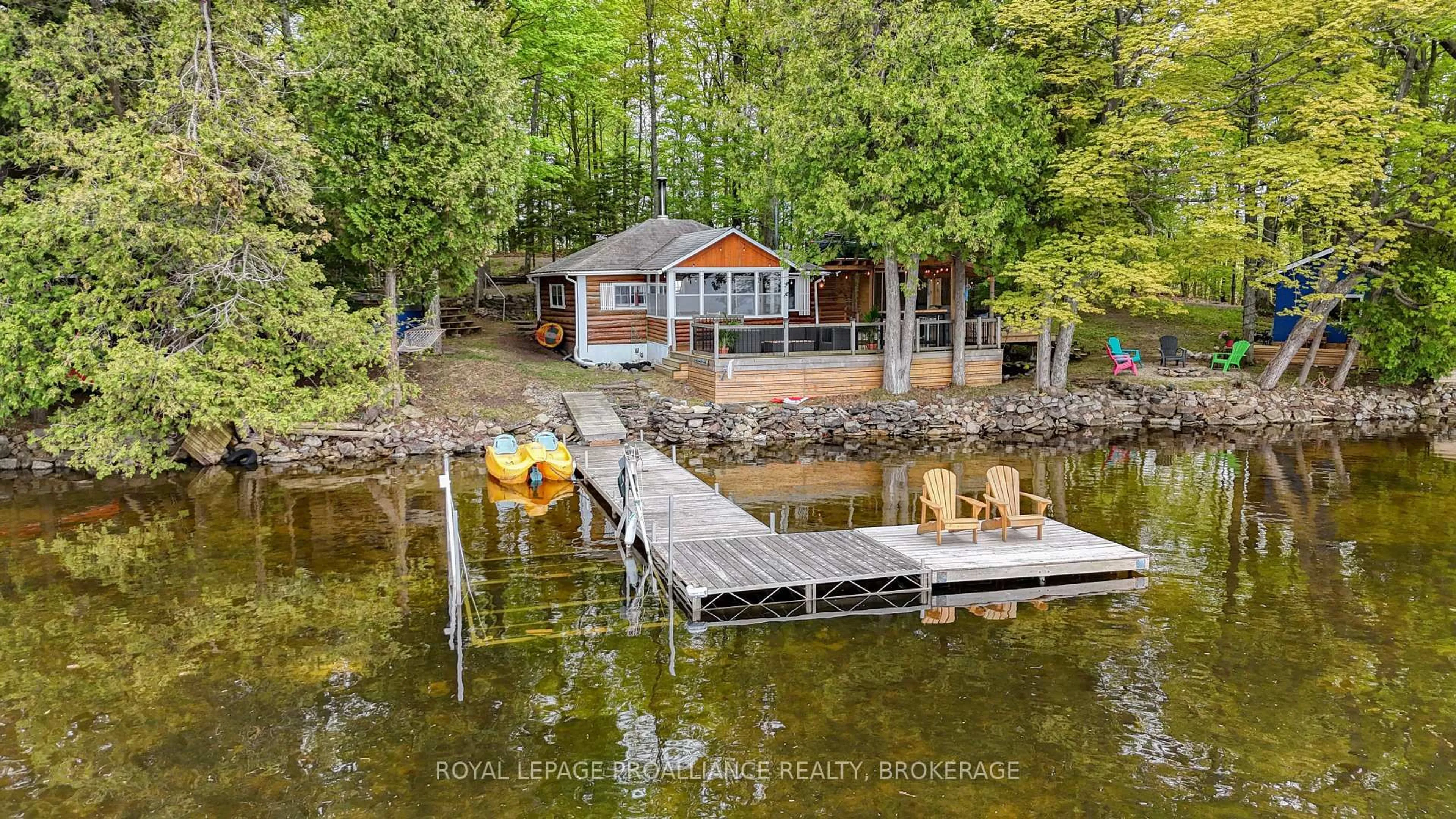 A pic from outside/outdoor area/front of a property/back of a property/a pic from drone, water/lake/river/ocean view for 11 Cypress Lane, Mcdonalds Corners Ontario K0G 1M0