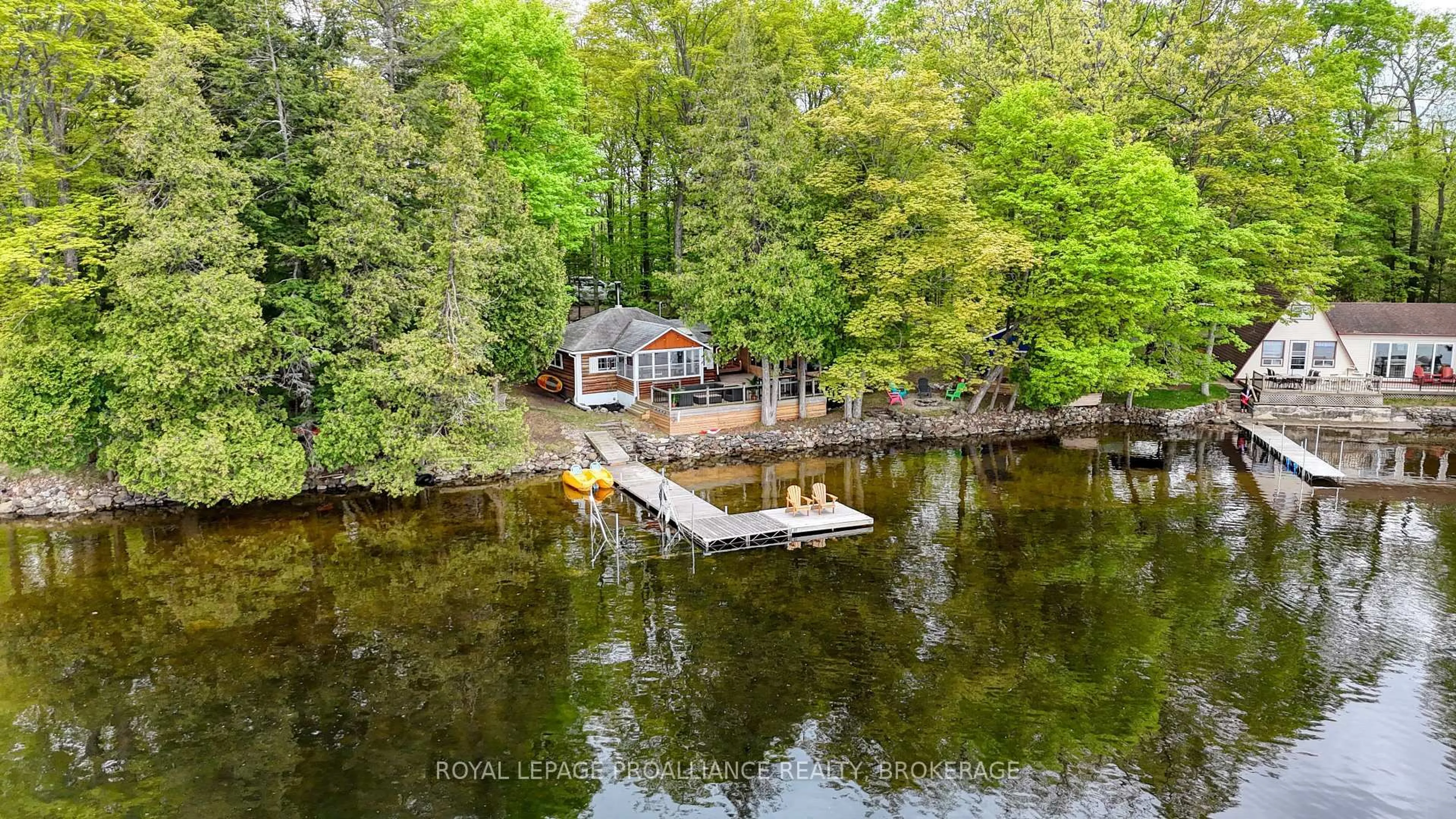 A pic from outside/outdoor area/front of a property/back of a property/a pic from drone, water/lake/river/ocean view for 11 Cypress Lane, Mcdonalds Corners Ontario K0G 1M0
