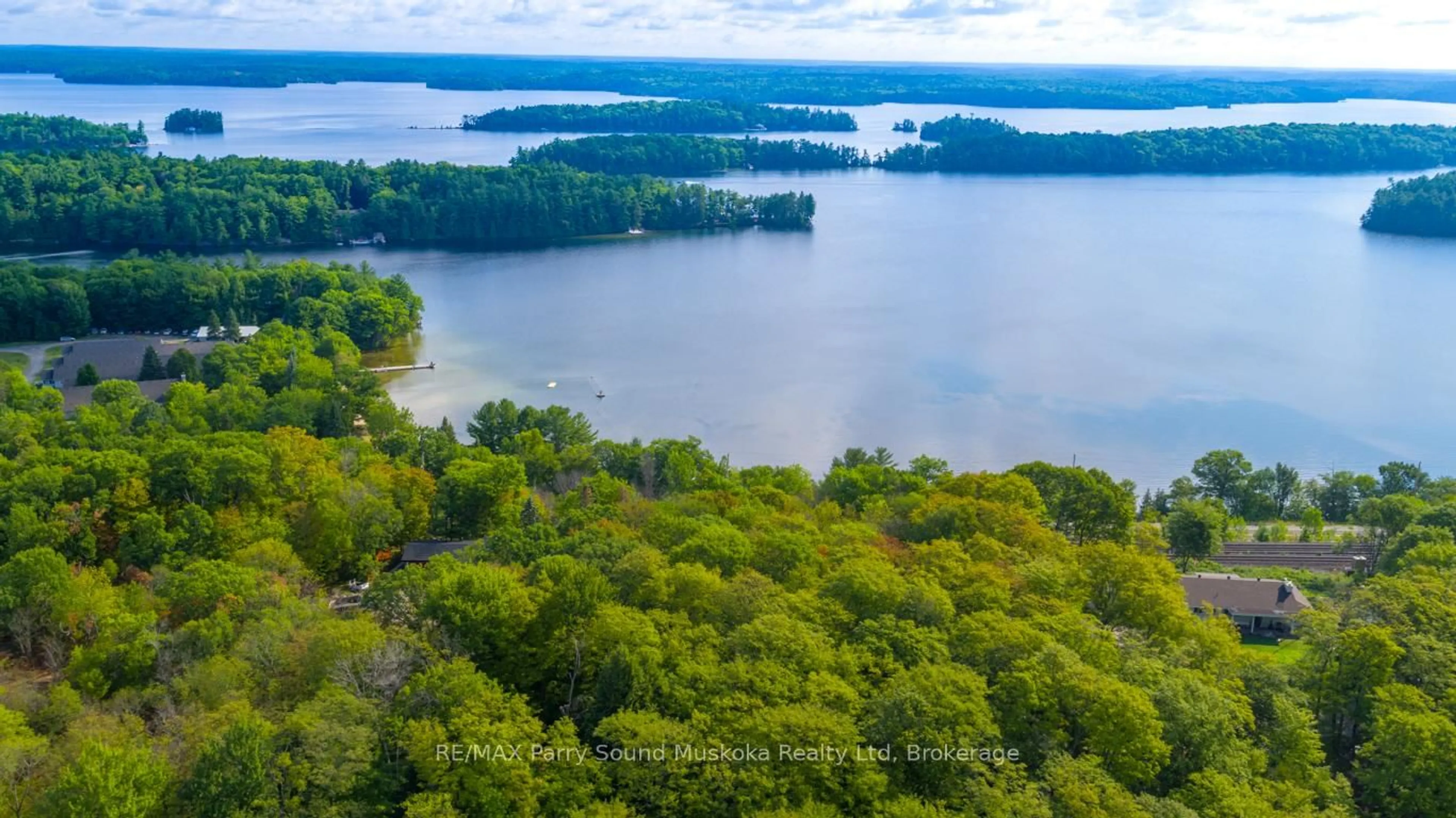 A pic from outside/outdoor area/front of a property/back of a property/a pic from drone, water/lake/river/ocean view for 143A Highway 612 N/A, Seguin Ontario P0C 1H0