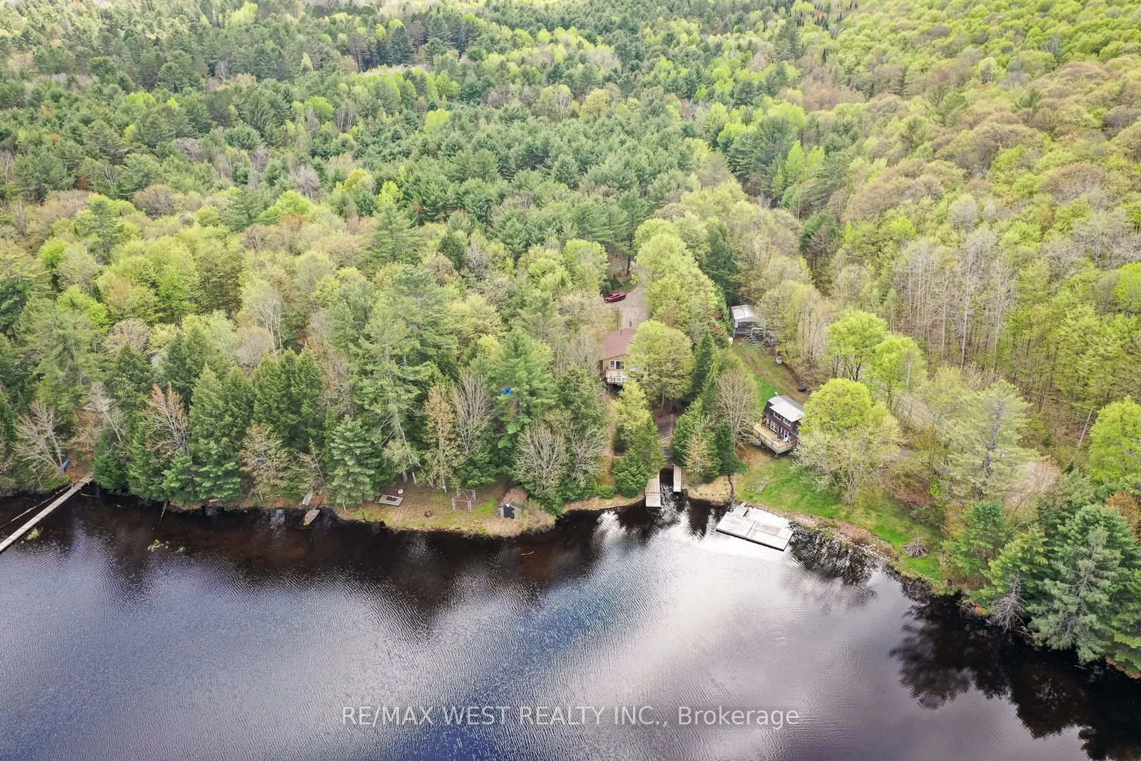 A pic from outside/outdoor area/front of a property/back of a property/a pic from drone, water/lake/river/ocean view for 1162 Burlmarie Rd #1, Lake of Bays Ontario P0B 1A0