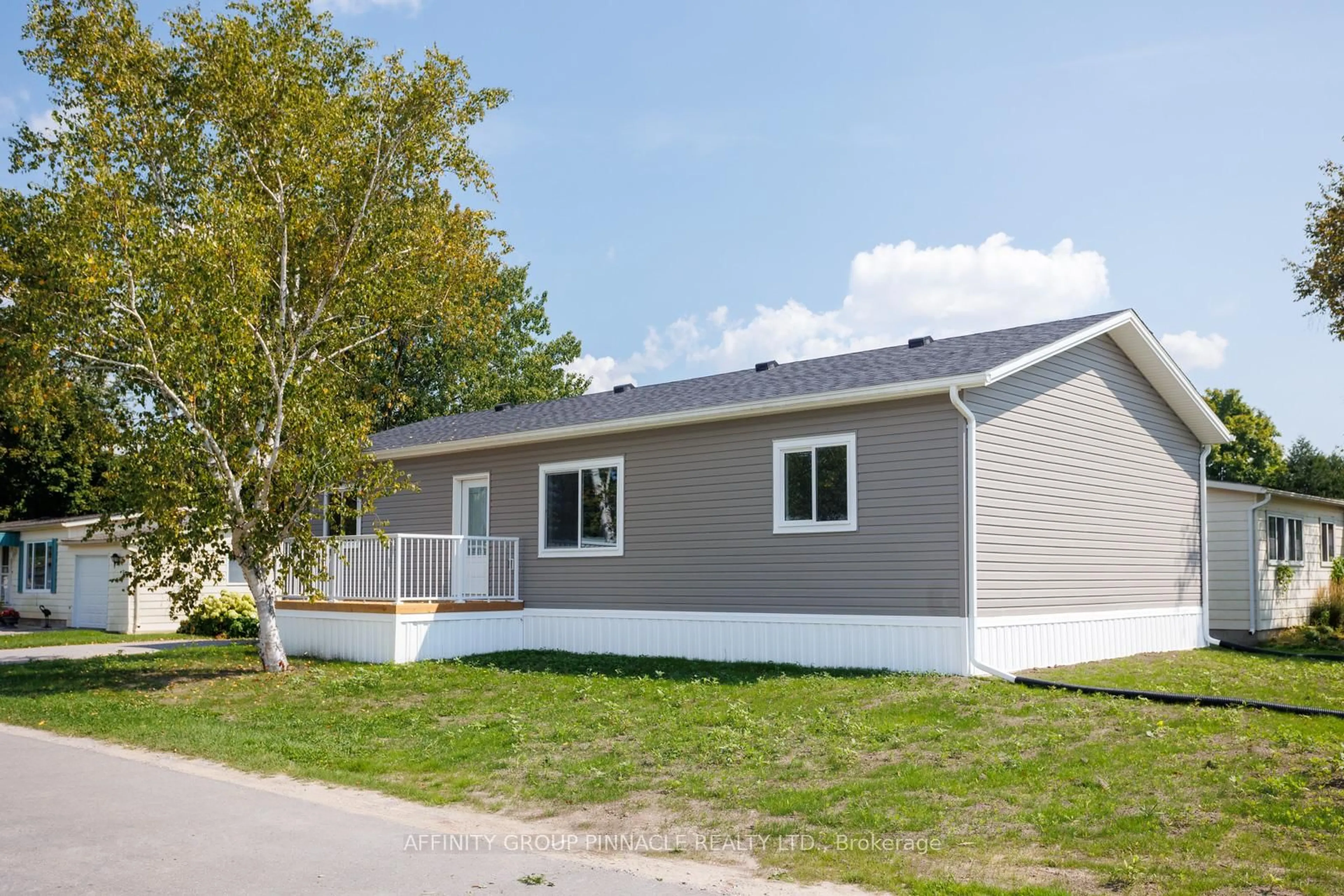Home with vinyl exterior material, street for 16 Park St, Kawartha Lakes Ontario K9V 0H7