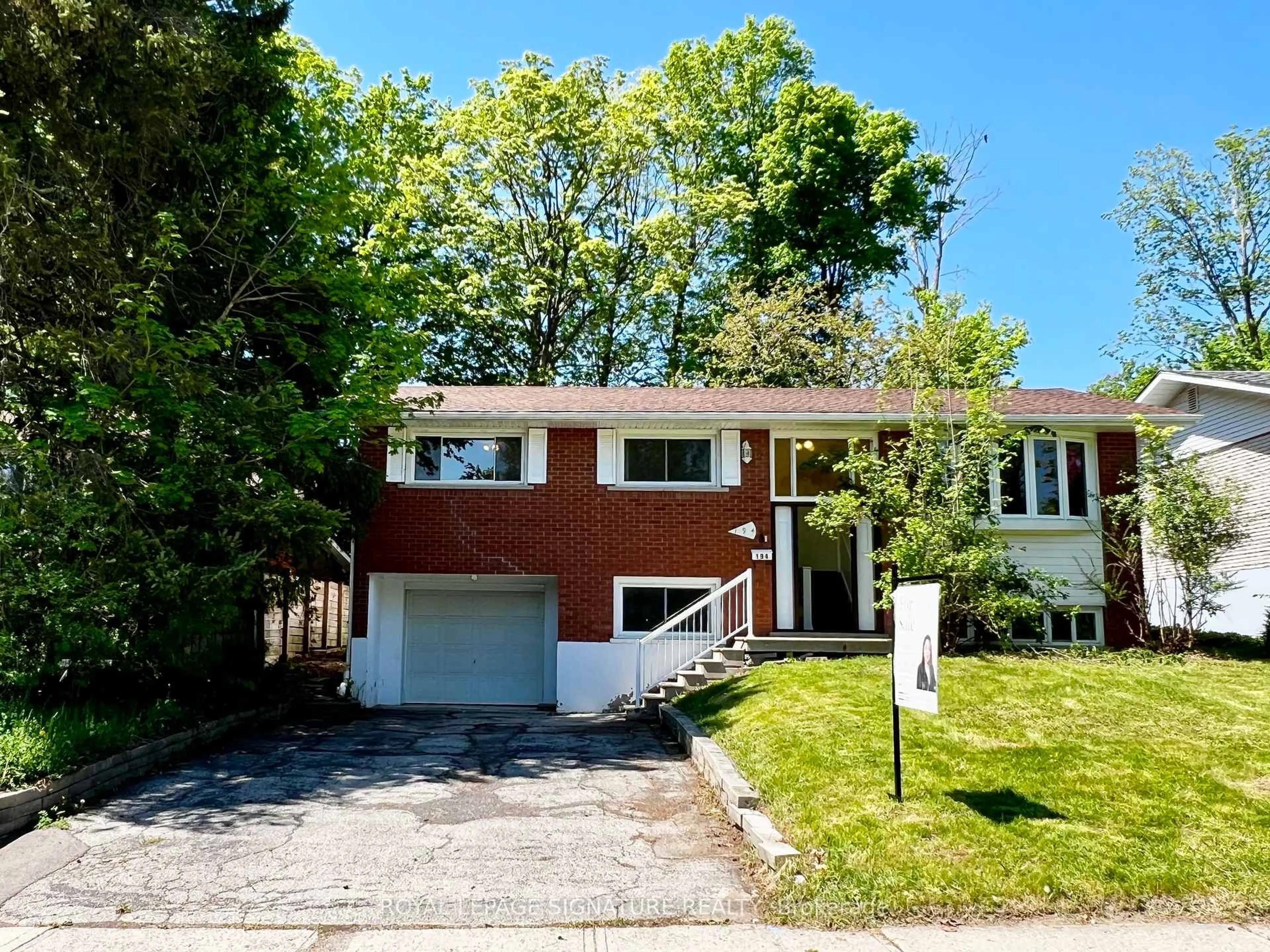 Home with brick exterior material, street for 194 Cedarbrae Ave, Waterloo Ontario N2L 4S5