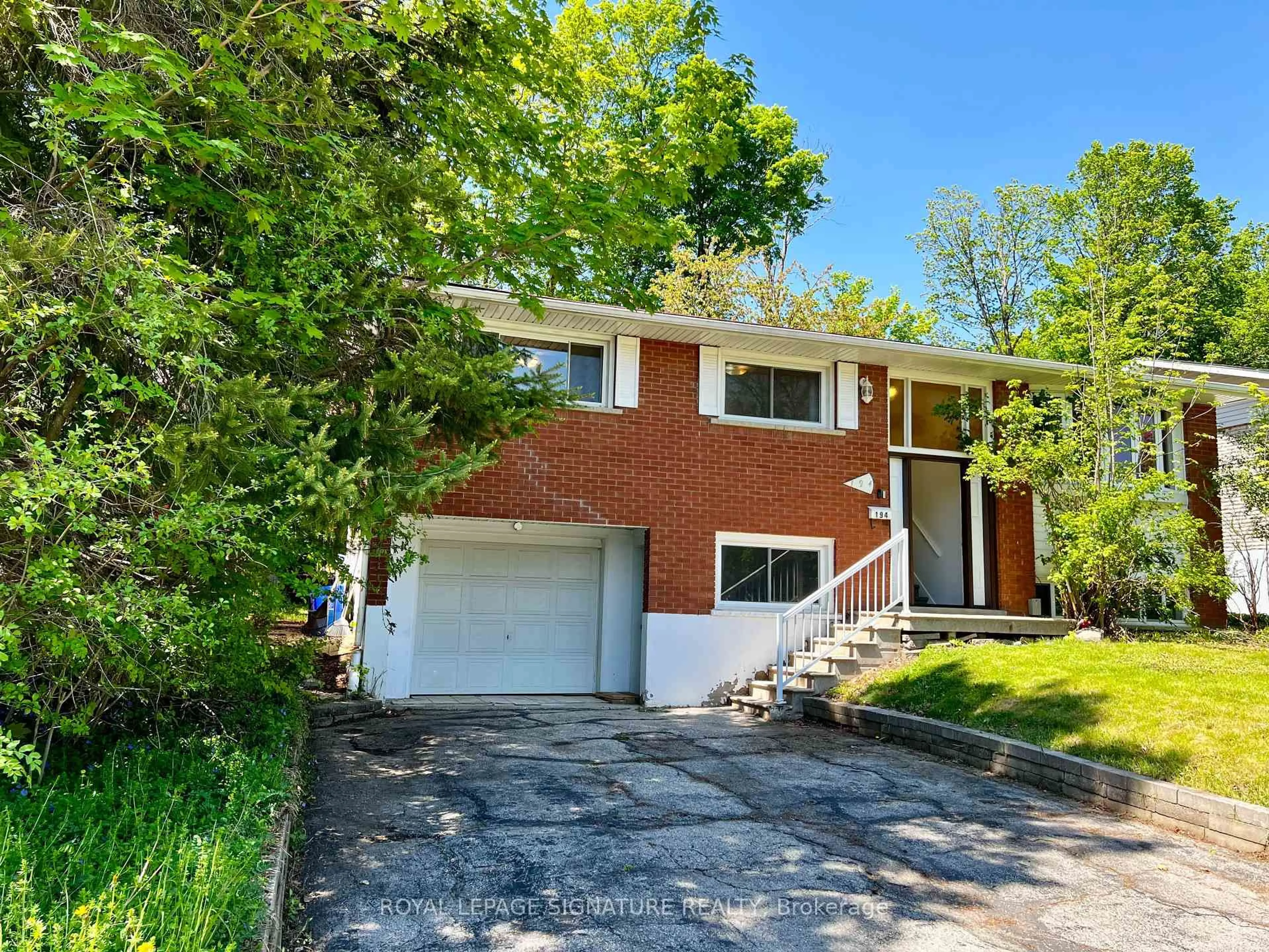 Home with brick exterior material, street for 194 Cedarbrae Ave, Waterloo Ontario N2L 4S5