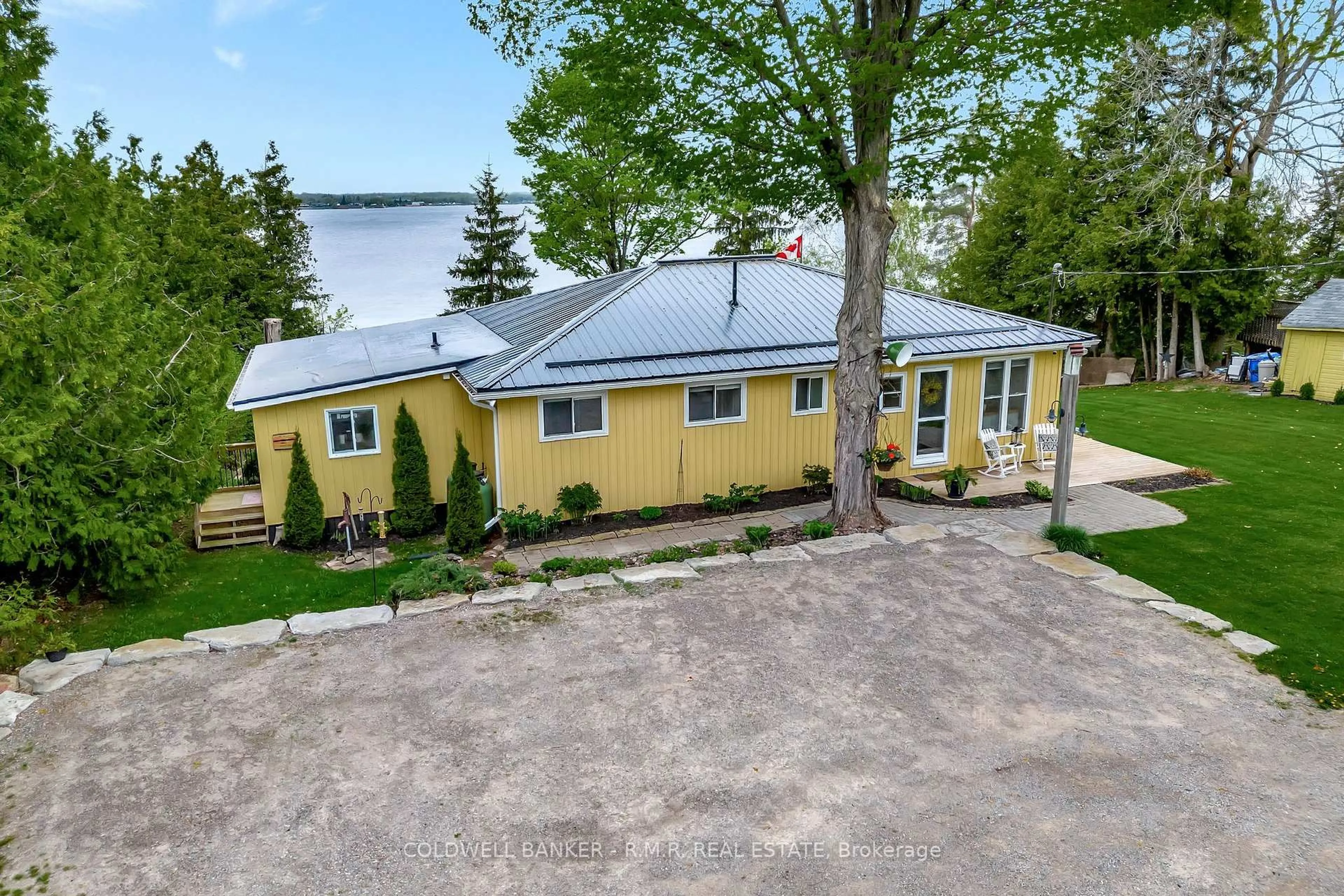 A pic from outside/outdoor area/front of a property/back of a property/a pic from drone, water/lake/river/ocean view for 22 Arbour St, Kawartha Lakes Ontario K9V 4R3