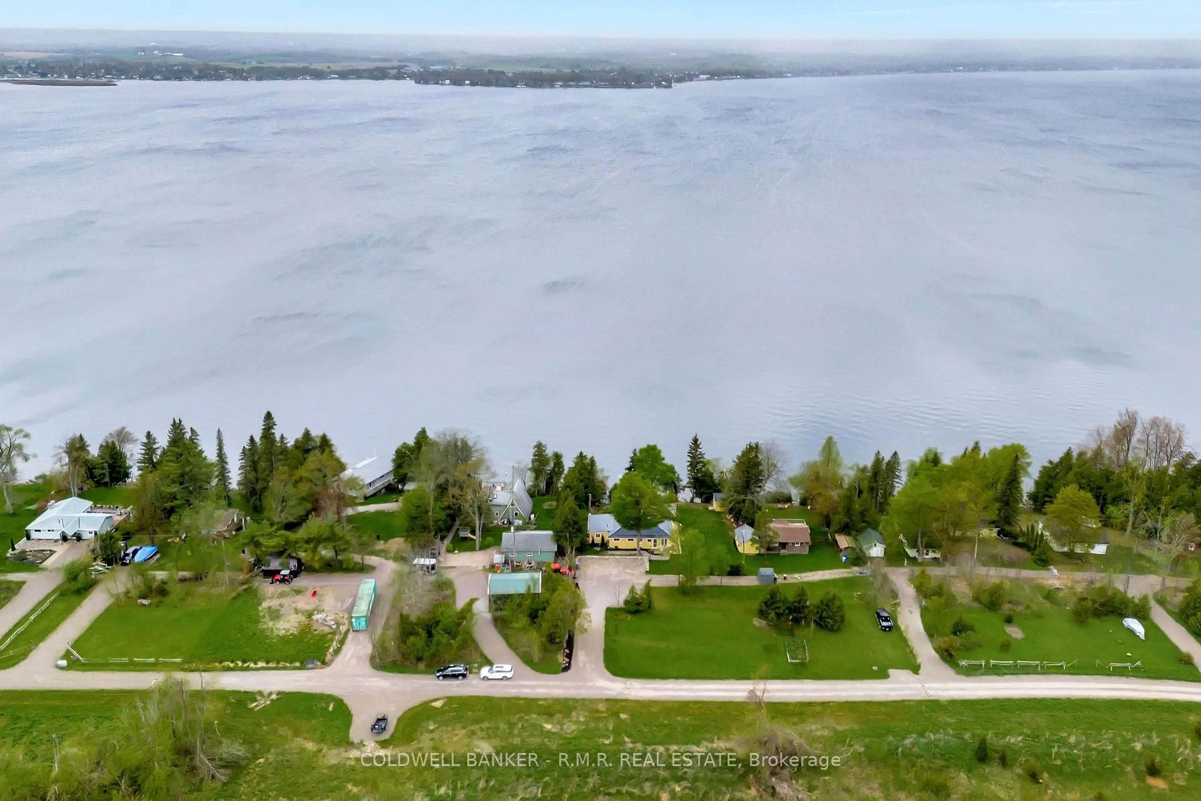 A pic from outside/outdoor area/front of a property/back of a property/a pic from drone, water/lake/river/ocean view for 22 Arbour St, Kawartha Lakes Ontario K9V 4R3