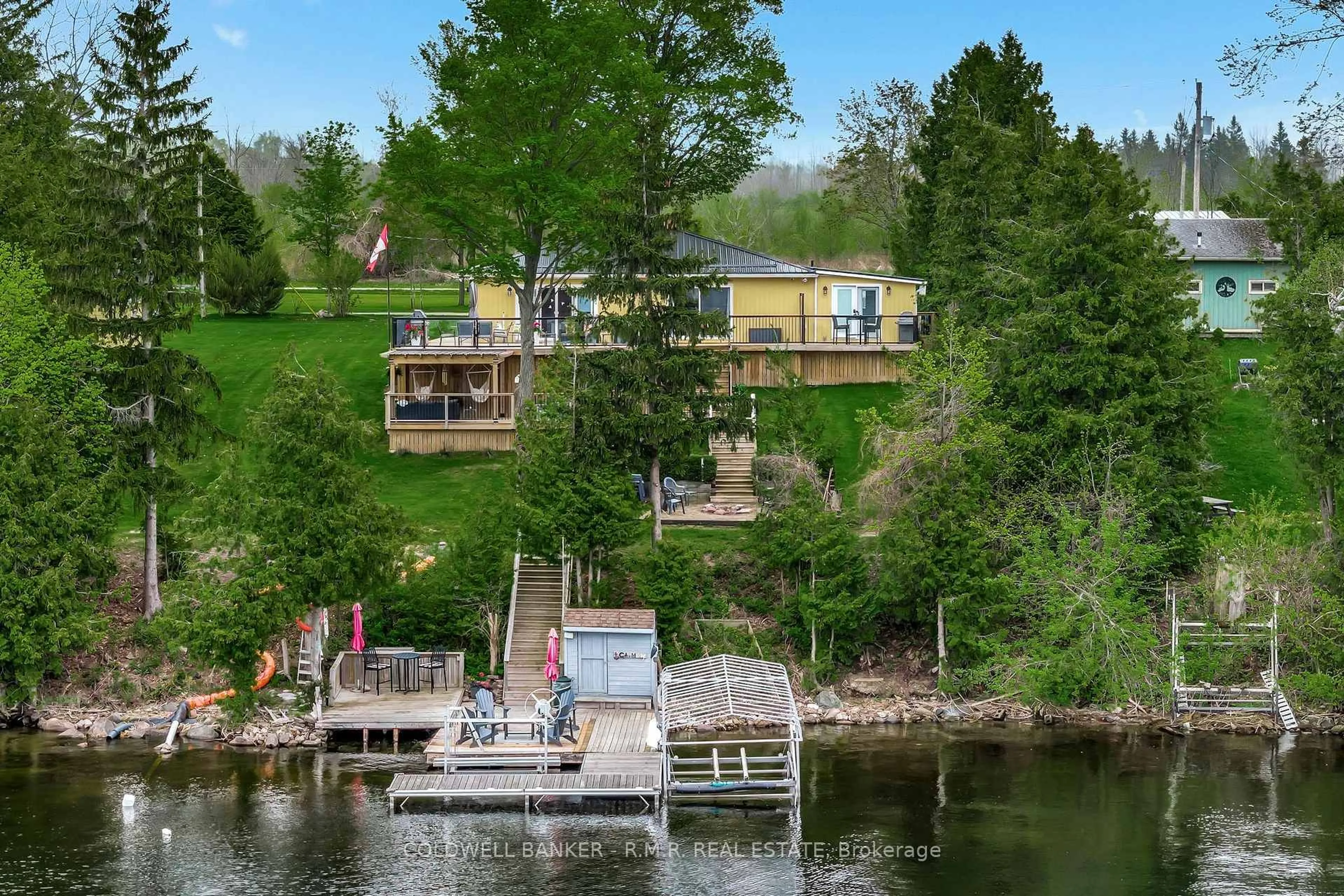 A pic from outside/outdoor area/front of a property/back of a property/a pic from drone, water/lake/river/ocean view for 22 Arbour St, Kawartha Lakes Ontario K9V 4R3