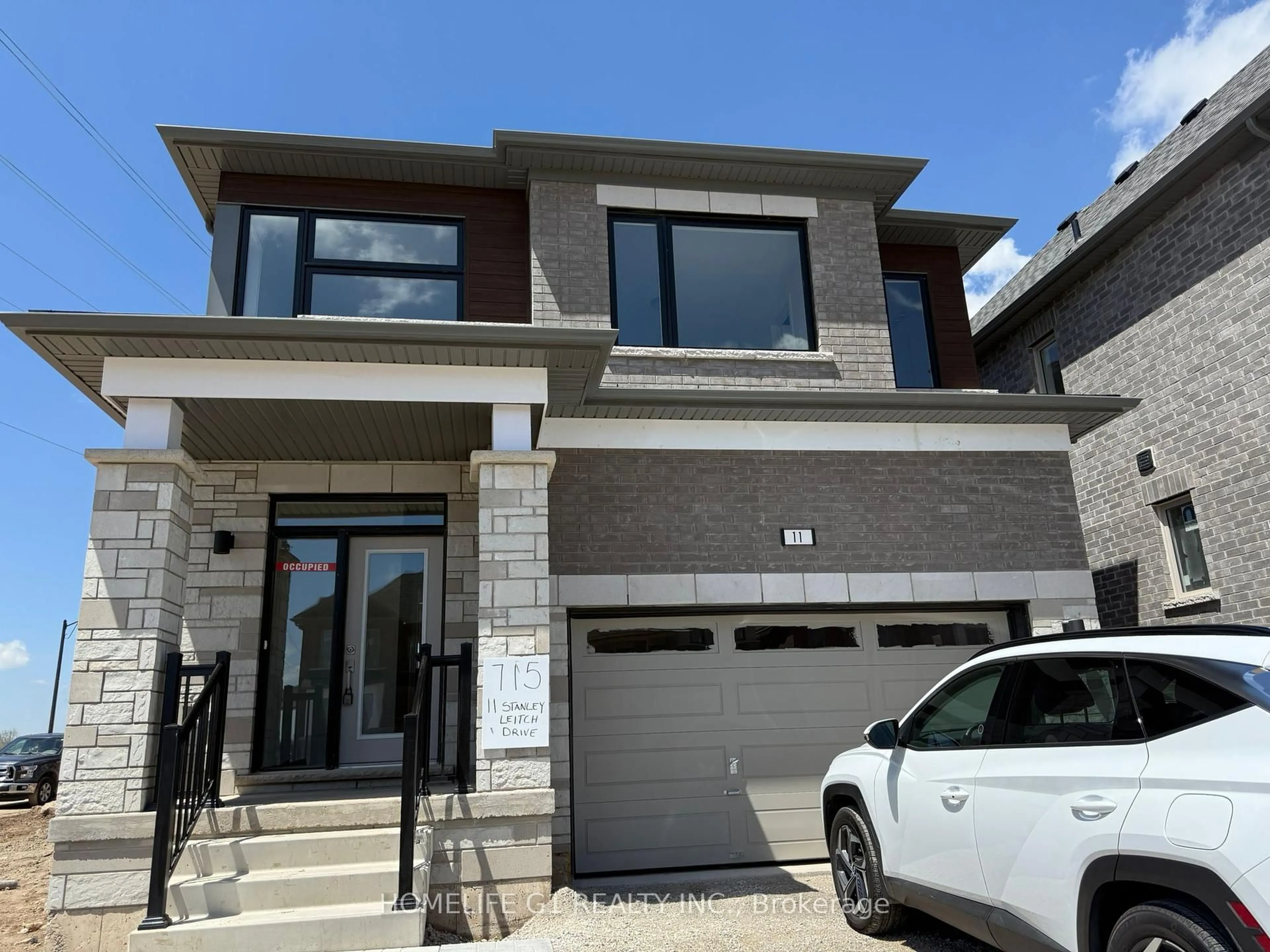 Home with brick exterior material, street for 11 Stanley Leitch Dr, Erin Ontario N0B 1T0