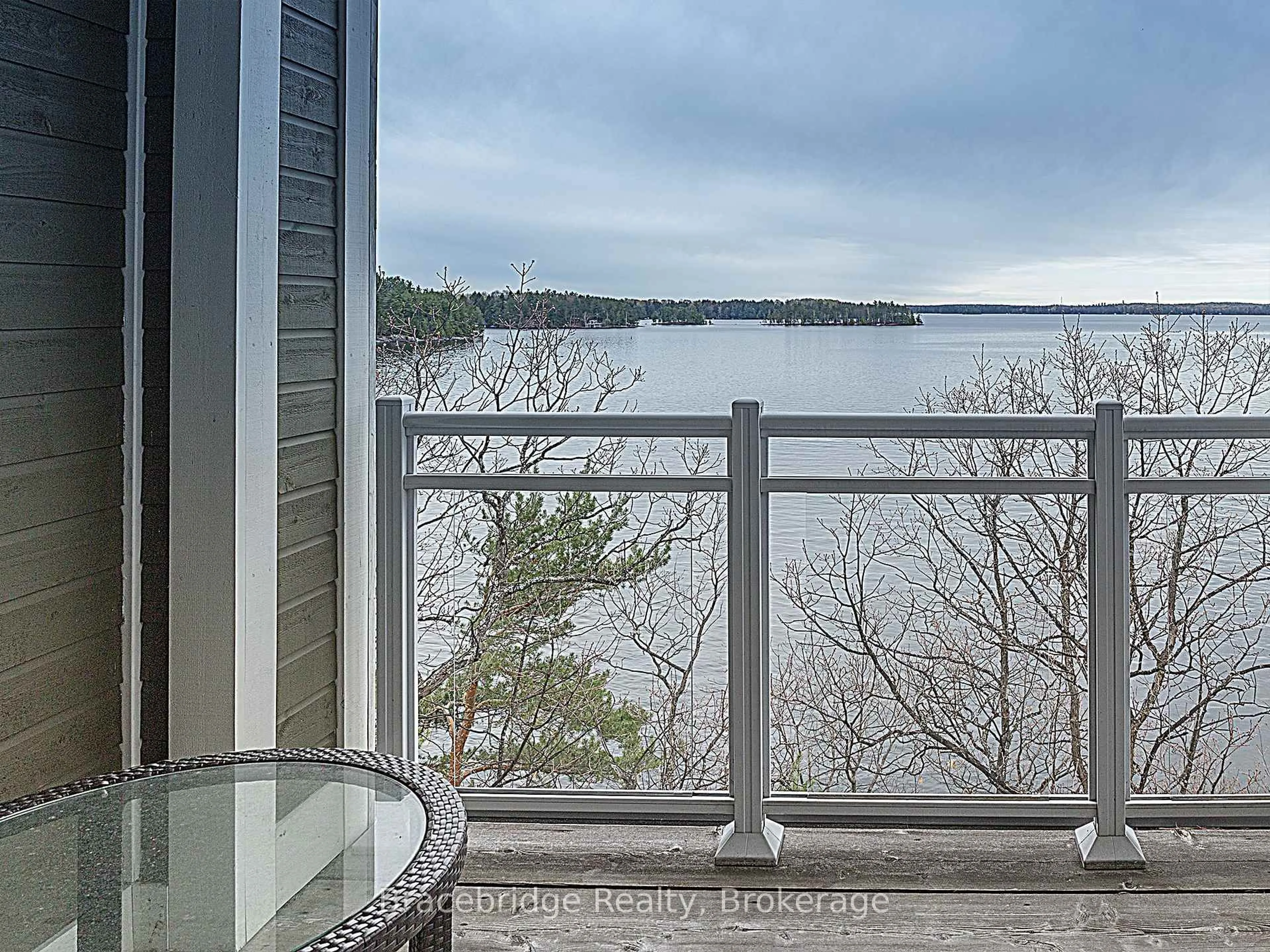 Balcony in the apartment, water/lake/river/ocean view for 1869 Muskoka Rd 118 Highway #B101-B2, Muskoka Lakes Ontario P1L 1W8