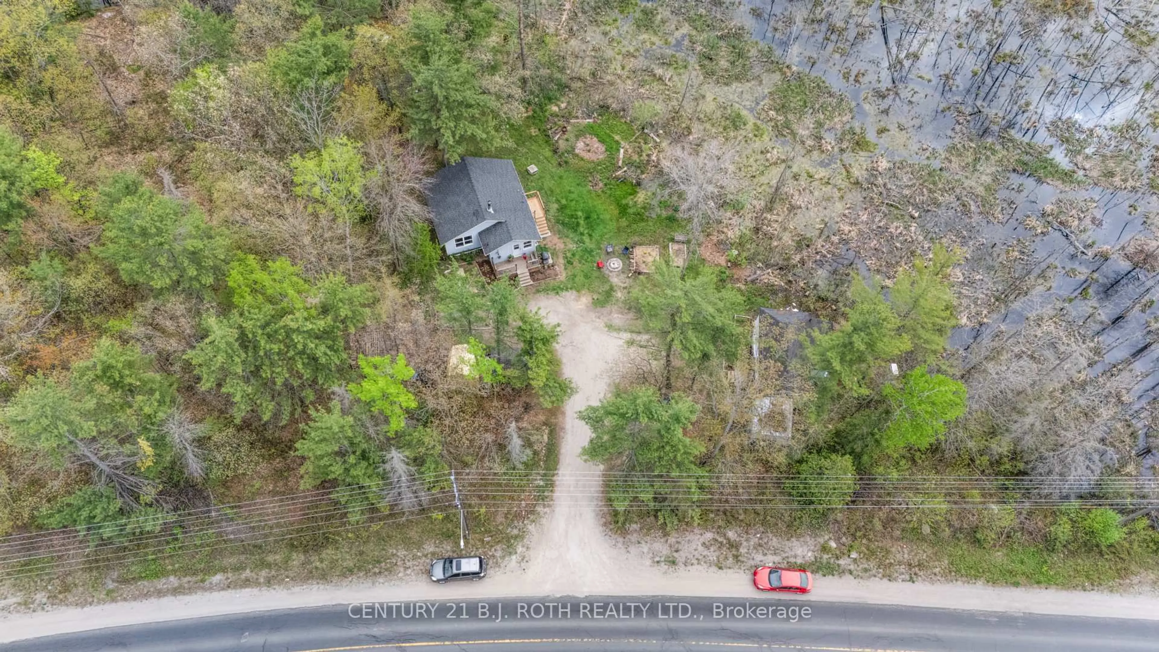 A pic from outside/outdoor area/front of a property/back of a property/a pic from drone, water/lake/river/ocean view for 2100 Honey Harbour Rd, Georgian Bay Ontario L0K 1S0