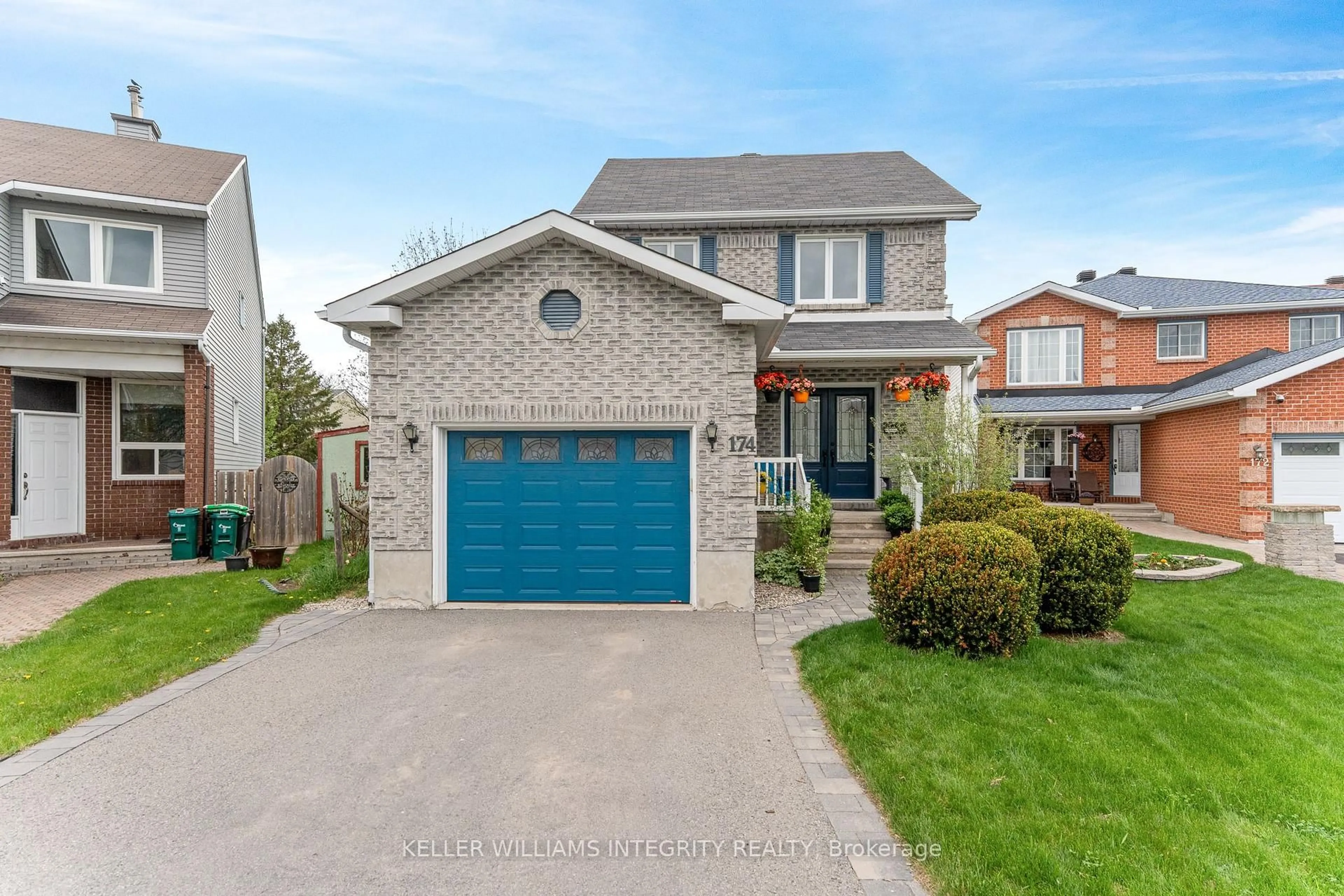 Home with brick exterior material, street for 174 Tartan Dr, Ottawa Ontario K2J 3X3