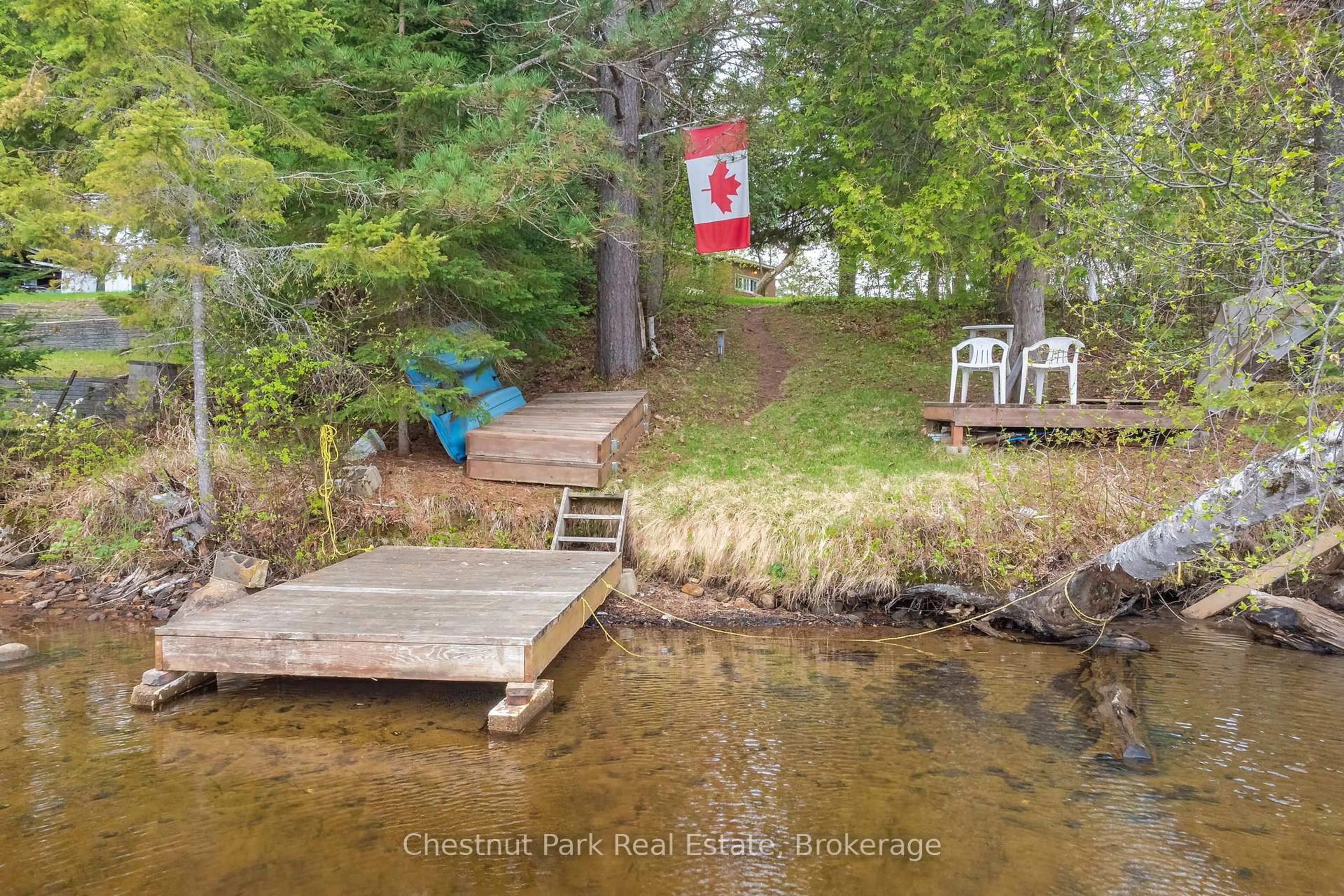 A pic from outside/outdoor area/front of a property/back of a property/a pic from drone, water/lake/river/ocean view for 24 Main St, Kearney Ontario P0A 1M0