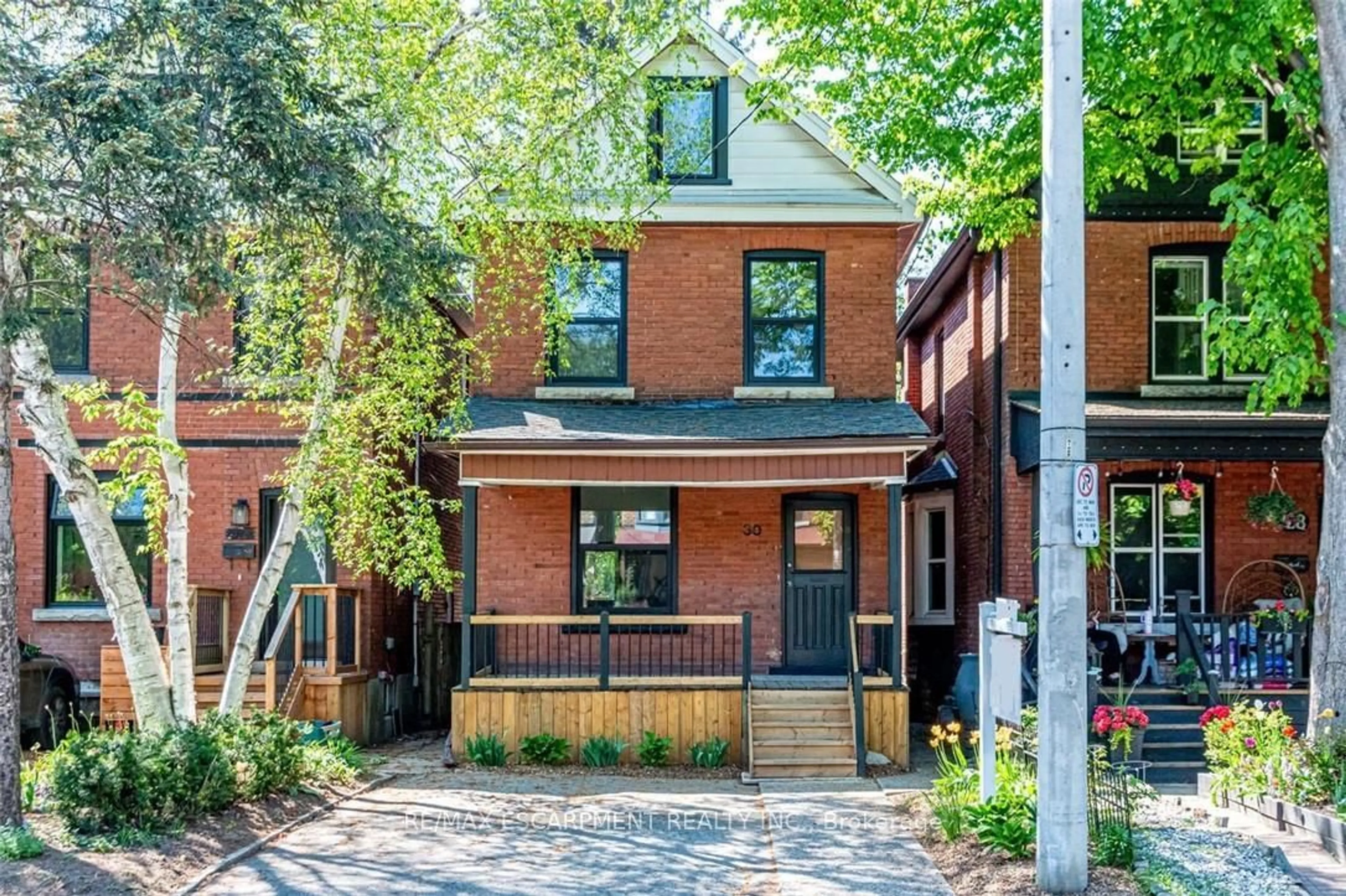 Home with brick exterior material, street for 30 Cedar Ave, Hamilton Ontario L8M 3A5