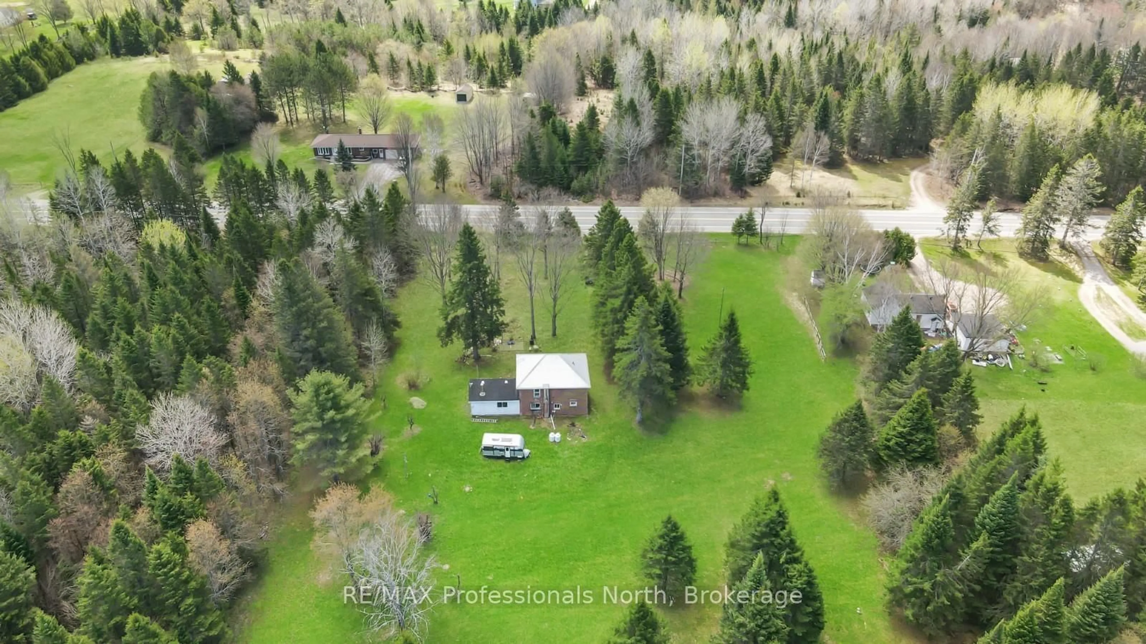 A pic from outside/outdoor area/front of a property/back of a property/a pic from drone, water/lake/river/ocean view for 18917 Highway 118 N/A, Highlands East Ontario K0L 2Y0