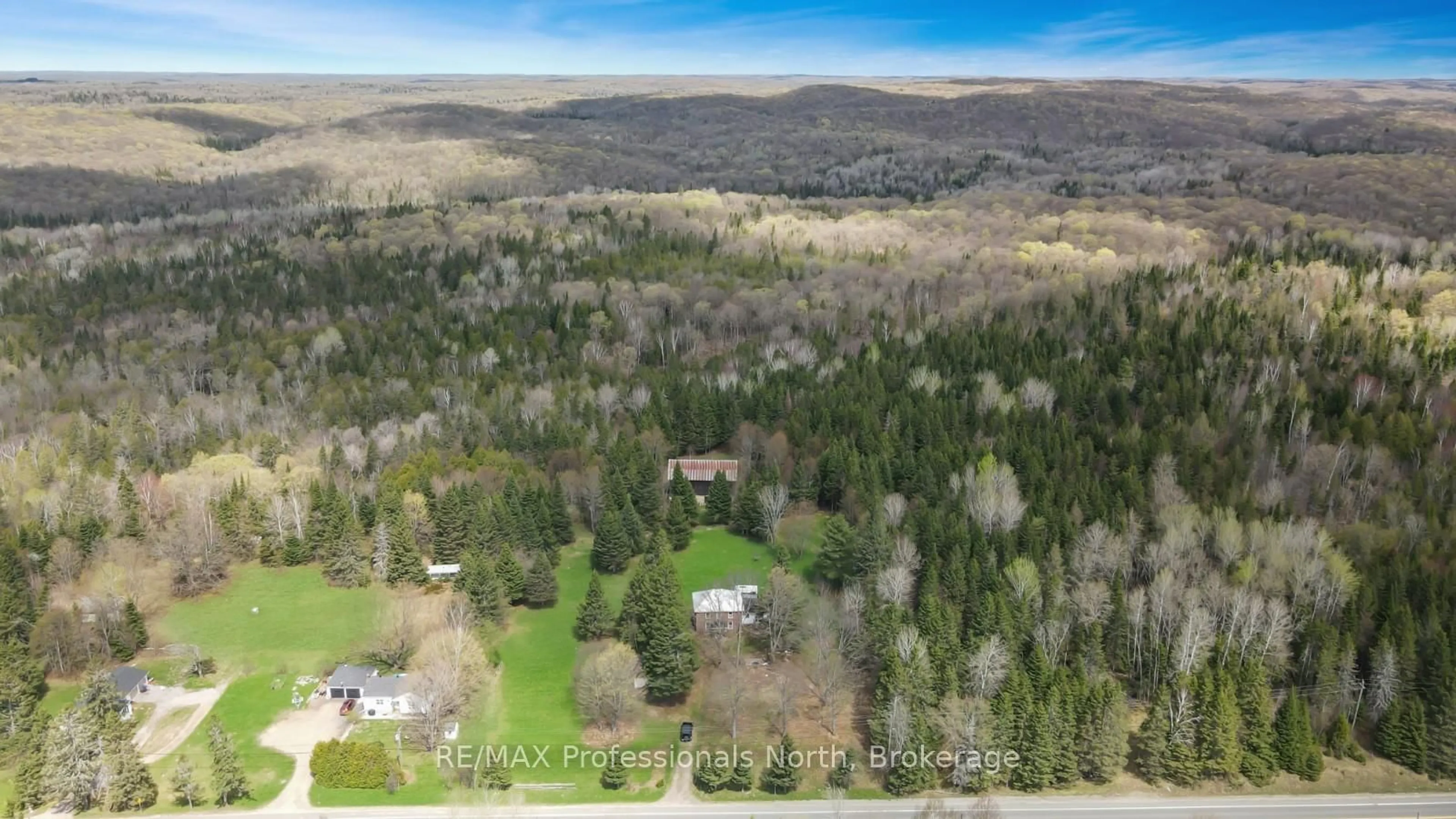 A pic from outside/outdoor area/front of a property/back of a property/a pic from drone, forest/trees view for 18917 Highway 118 N/A, Highlands East Ontario K0L 2Y0